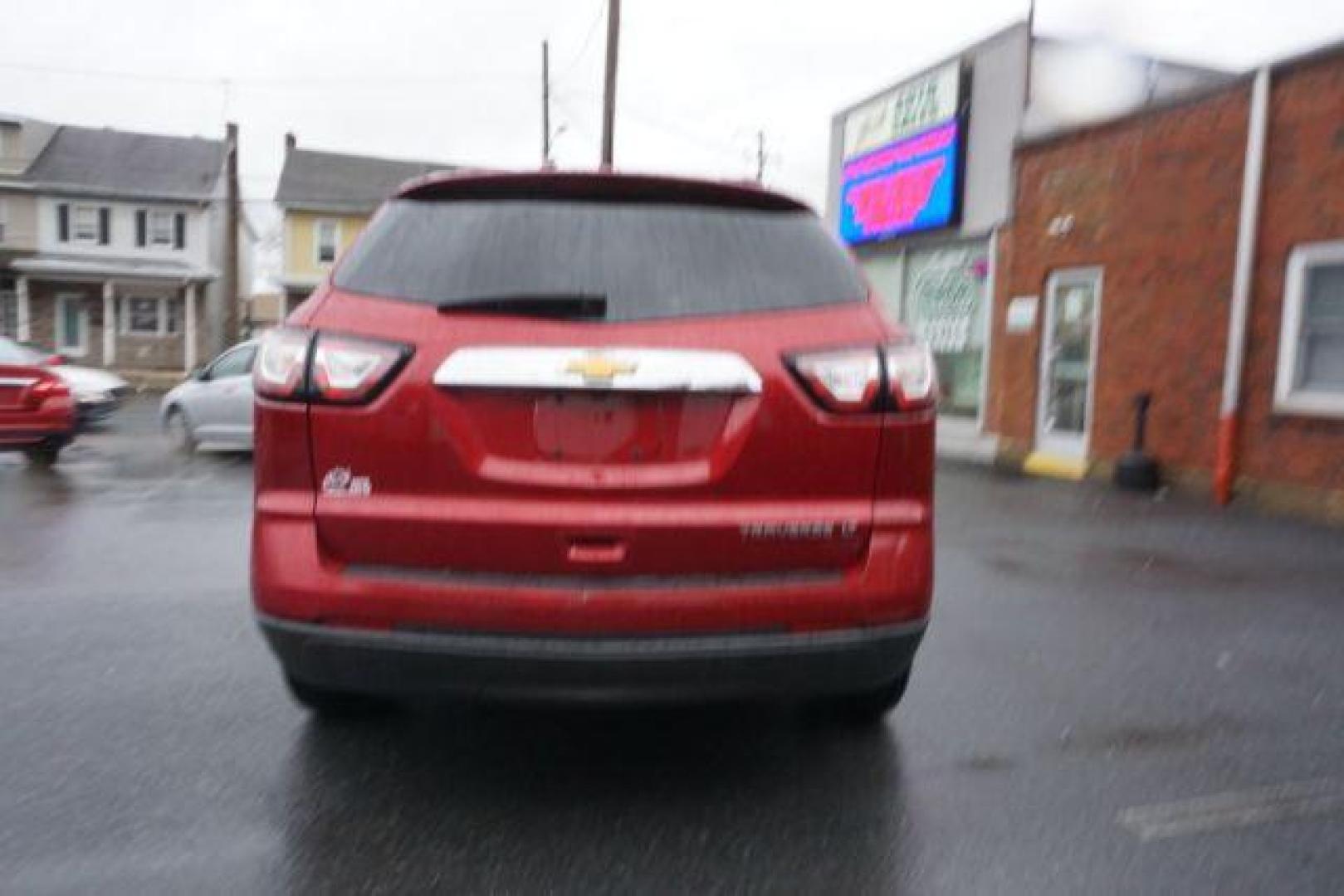 2014 Crystal Red Tintcoat /Dk Titanium/Light Titanium Chevrolet Traverse 1LT FWD (1GNKRGKD4EJ) with an 3.6L V6 DOHC 24V engine, 6-Speed Automatic transmission, located at 312 Centre Ave, Schuylkill Haven, PA, 17972, (570) 593-5278, 40.638130, -76.177383 - automatic climate control, heated front seats, power driver's seat, power sunroof, universal garage door opener - Photo#9