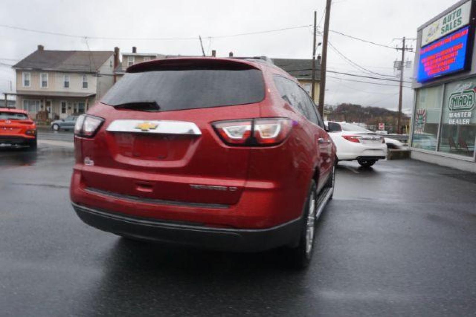 2014 Crystal Red Tintcoat /Dk Titanium/Light Titanium Chevrolet Traverse 1LT FWD (1GNKRGKD4EJ) with an 3.6L V6 DOHC 24V engine, 6-Speed Automatic transmission, located at 312 Centre Ave, Schuylkill Haven, PA, 17972, (570) 593-5278, 40.638130, -76.177383 - automatic climate control, heated front seats, power driver's seat, power sunroof, universal garage door opener - Photo#10