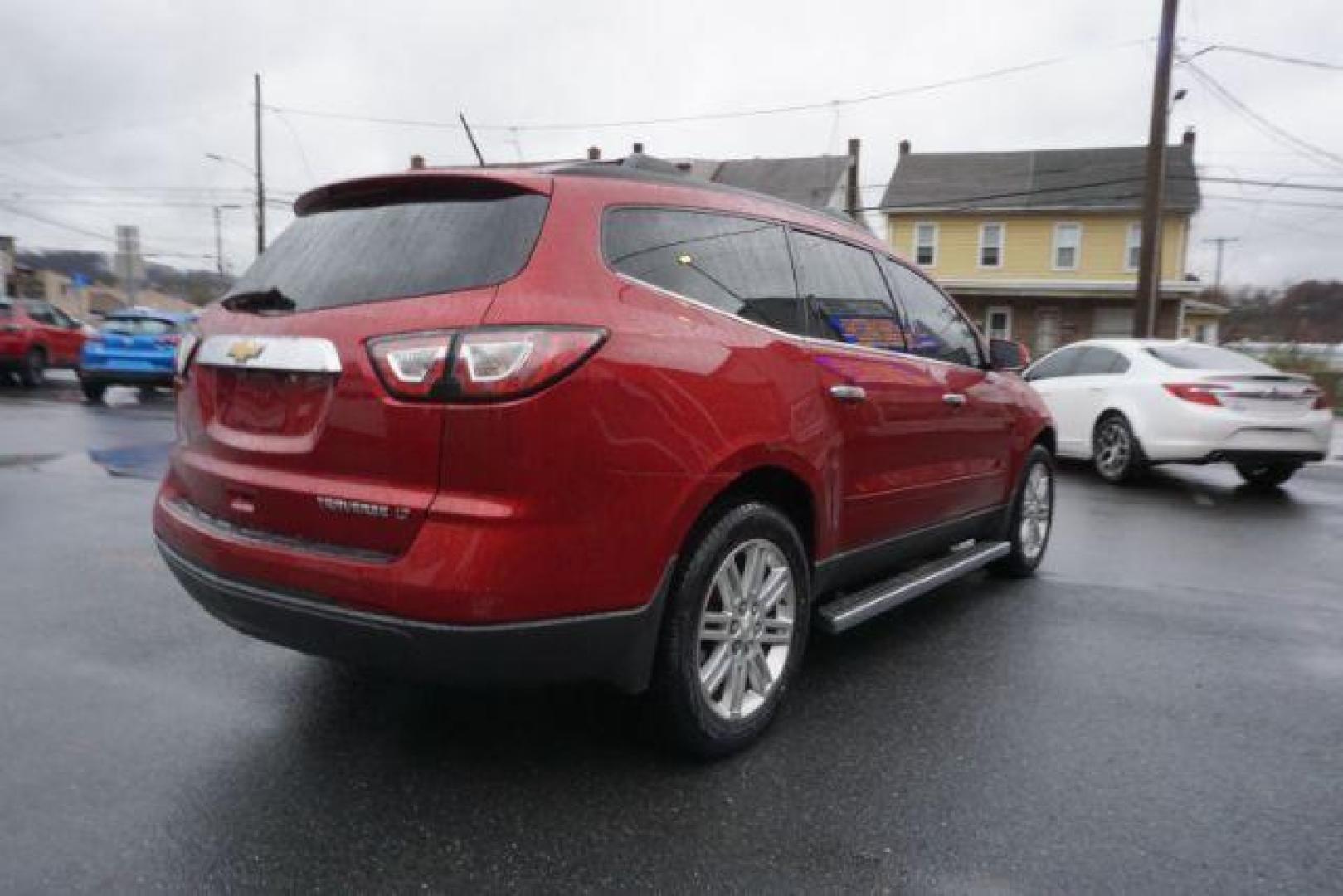 2014 Crystal Red Tintcoat /Dk Titanium/Light Titanium Chevrolet Traverse 1LT FWD (1GNKRGKD4EJ) with an 3.6L V6 DOHC 24V engine, 6-Speed Automatic transmission, located at 312 Centre Ave, Schuylkill Haven, PA, 17972, (570) 593-5278, 40.638130, -76.177383 - automatic climate control, heated front seats, power driver's seat, power sunroof, universal garage door opener - Photo#11