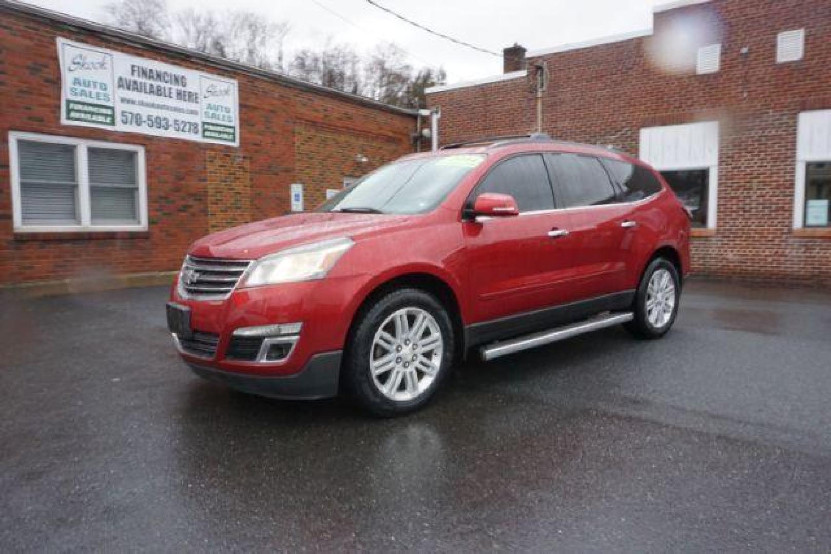 2014 Crystal Red Tintcoat /Dk Titanium/Light Titanium Chevrolet Traverse 1LT FWD (1GNKRGKD4EJ) with an 3.6L V6 DOHC 24V engine, 6-Speed Automatic transmission, located at 312 Centre Ave, Schuylkill Haven, PA, 17972, (570) 593-5278, 40.638130, -76.177383 - automatic climate control, heated front seats, power driver's seat, power sunroof, universal garage door opener - Photo#1