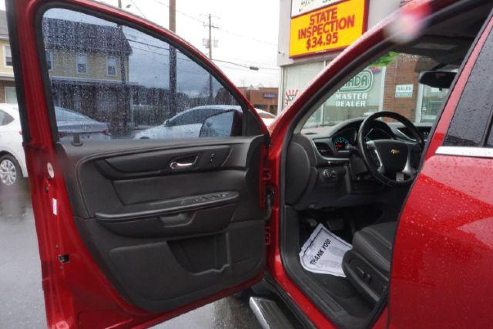 2014 Crystal Red Tintcoat /Dk Titanium/Light Titanium Chevrolet Traverse 1LT FWD (1GNKRGKD4EJ) with an 3.6L V6 DOHC 24V engine, 6-Speed Automatic transmission, located at 312 Centre Ave, Schuylkill Haven, PA, 17972, (570) 593-5278, 40.638130, -76.177383 - automatic climate control, heated front seats, power driver's seat, power sunroof, universal garage door opener - Photo#19