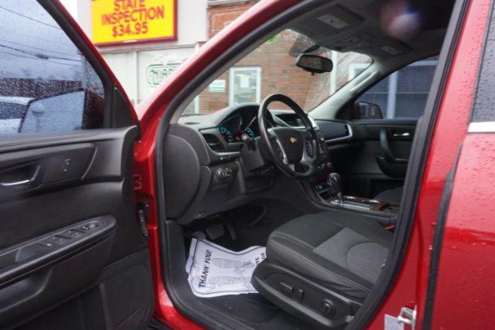 2014 Crystal Red Tintcoat /Dk Titanium/Light Titanium Chevrolet Traverse 1LT FWD (1GNKRGKD4EJ) with an 3.6L V6 DOHC 24V engine, 6-Speed Automatic transmission, located at 312 Centre Ave, Schuylkill Haven, PA, 17972, (570) 593-5278, 40.638130, -76.177383 - automatic climate control, heated front seats, power driver's seat, power sunroof, universal garage door opener - Photo#21