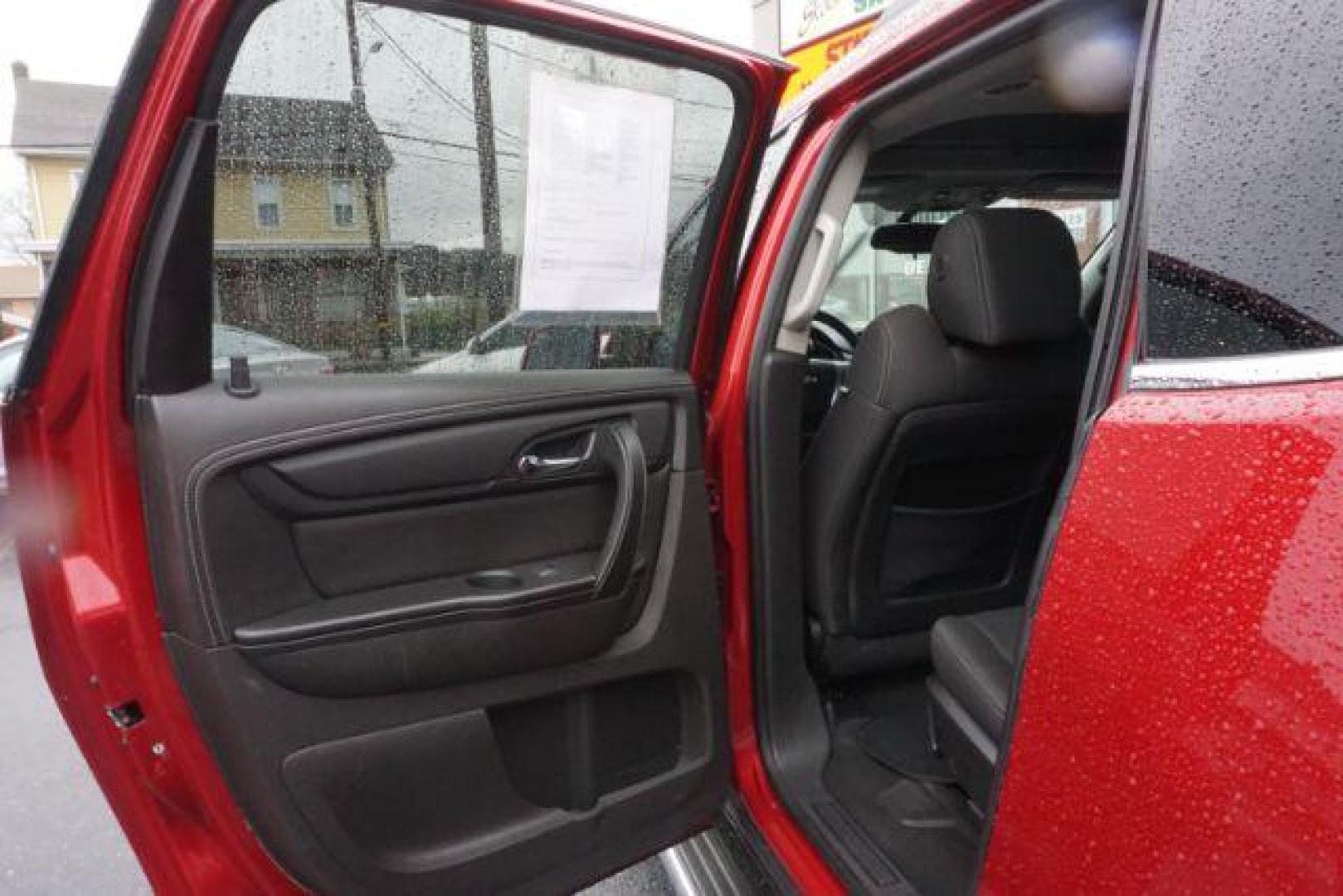 2014 Crystal Red Tintcoat /Dk Titanium/Light Titanium Chevrolet Traverse 1LT FWD (1GNKRGKD4EJ) with an 3.6L V6 DOHC 24V engine, 6-Speed Automatic transmission, located at 312 Centre Ave, Schuylkill Haven, PA, 17972, (570) 593-5278, 40.638130, -76.177383 - automatic climate control, heated front seats, power driver's seat, power sunroof, universal garage door opener - Photo#33