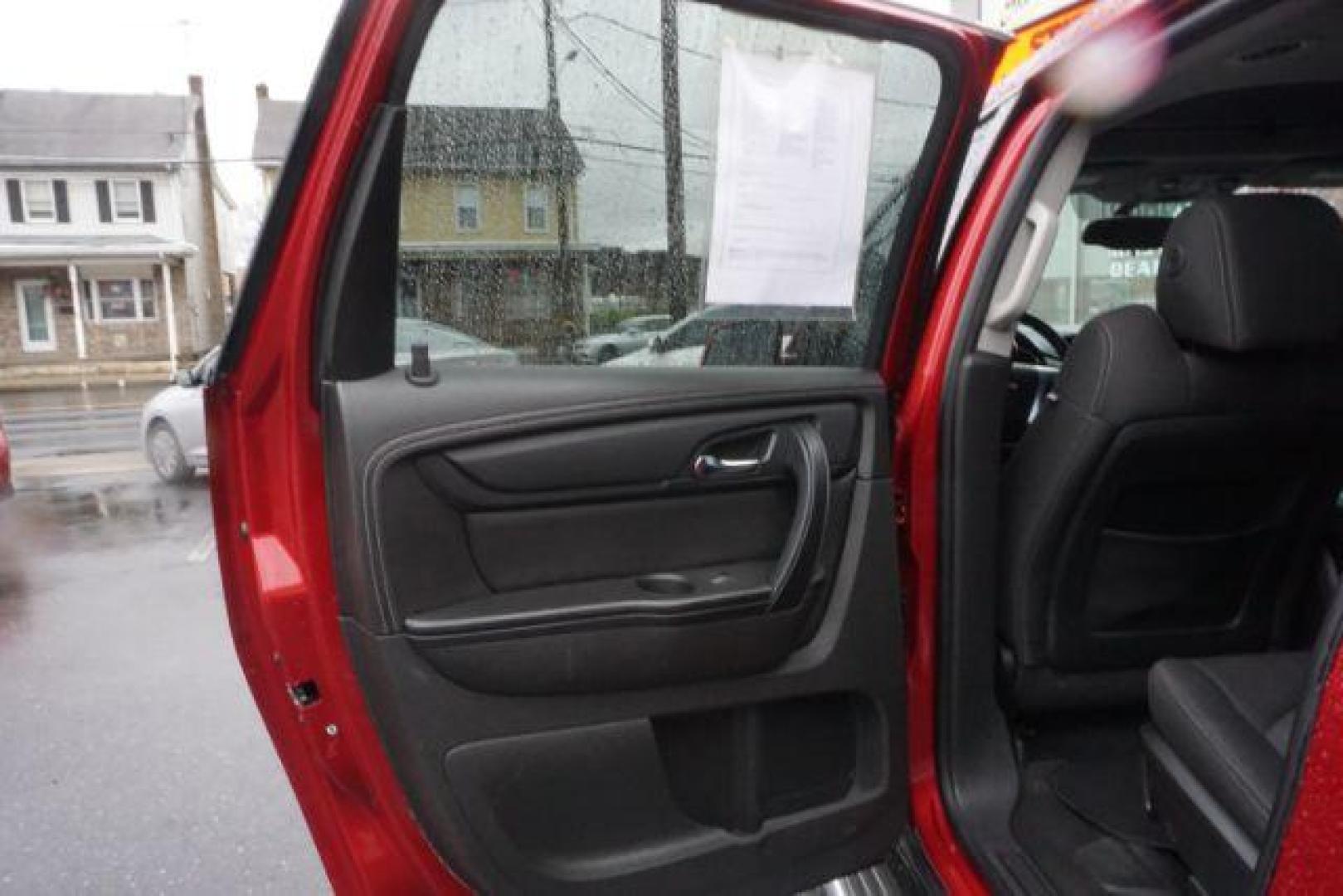 2014 Crystal Red Tintcoat /Dk Titanium/Light Titanium Chevrolet Traverse 1LT FWD (1GNKRGKD4EJ) with an 3.6L V6 DOHC 24V engine, 6-Speed Automatic transmission, located at 312 Centre Ave, Schuylkill Haven, PA, 17972, (570) 593-5278, 40.638130, -76.177383 - automatic climate control, heated front seats, power driver's seat, power sunroof, universal garage door opener - Photo#34