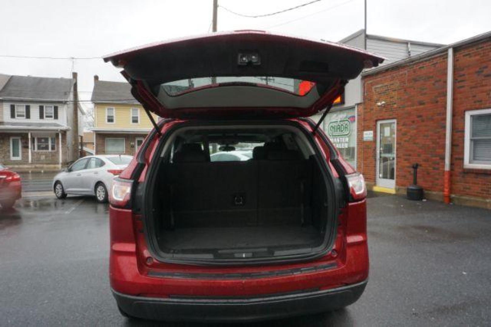 2014 Crystal Red Tintcoat /Dk Titanium/Light Titanium Chevrolet Traverse 1LT FWD (1GNKRGKD4EJ) with an 3.6L V6 DOHC 24V engine, 6-Speed Automatic transmission, located at 312 Centre Ave, Schuylkill Haven, PA, 17972, (570) 593-5278, 40.638130, -76.177383 - automatic climate control, heated front seats, power driver's seat, power sunroof, universal garage door opener - Photo#44