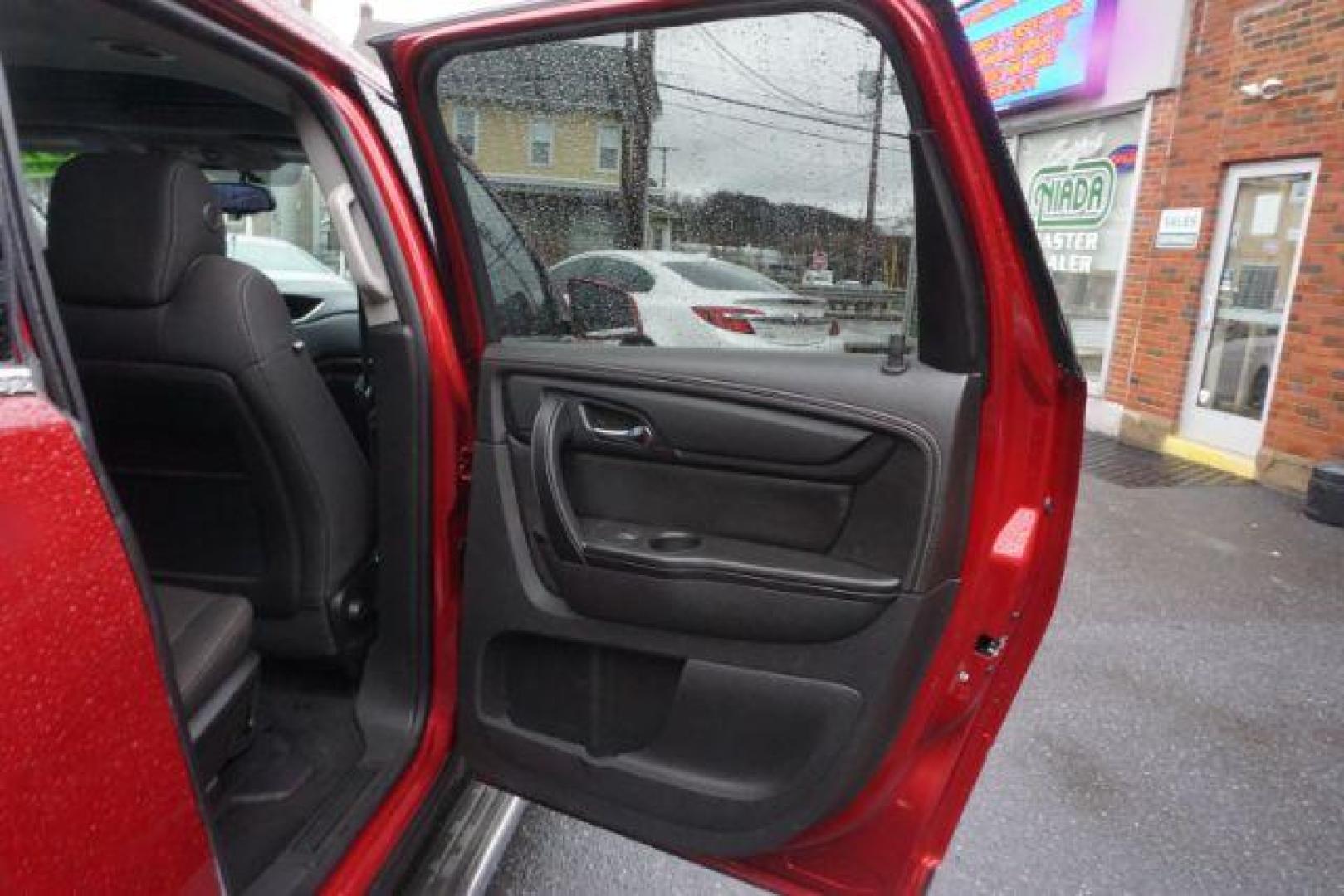 2014 Crystal Red Tintcoat /Dk Titanium/Light Titanium Chevrolet Traverse 1LT FWD (1GNKRGKD4EJ) with an 3.6L V6 DOHC 24V engine, 6-Speed Automatic transmission, located at 312 Centre Ave, Schuylkill Haven, PA, 17972, (570) 593-5278, 40.638130, -76.177383 - automatic climate control, heated front seats, power driver's seat, power sunroof, universal garage door opener - Photo#46