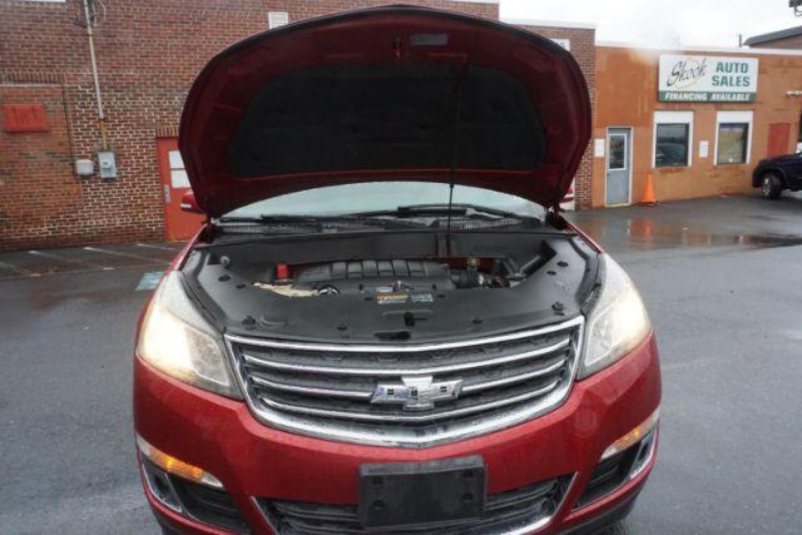 2014 Crystal Red Tintcoat /Dk Titanium/Light Titanium Chevrolet Traverse 1LT FWD (1GNKRGKD4EJ) with an 3.6L V6 DOHC 24V engine, 6-Speed Automatic transmission, located at 312 Centre Ave, Schuylkill Haven, PA, 17972, (570) 593-5278, 40.638130, -76.177383 - automatic climate control, heated front seats, power driver's seat, power sunroof, universal garage door opener - Photo#59