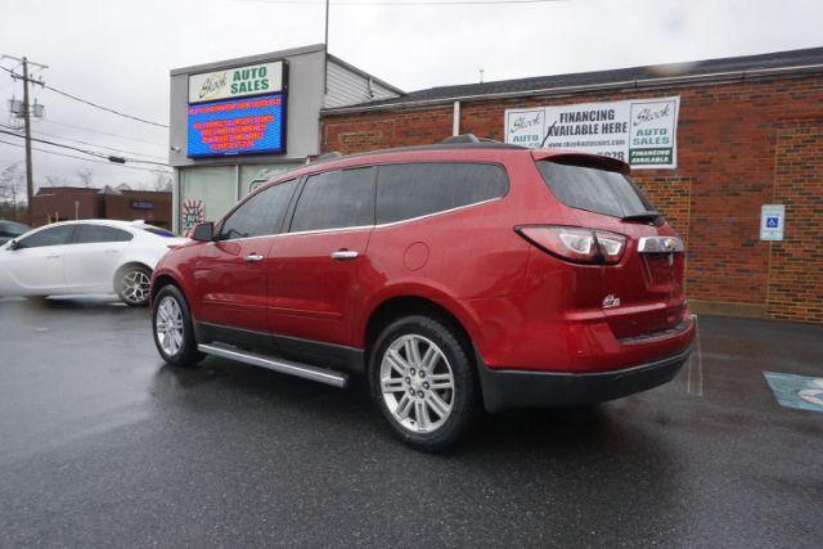 2014 Crystal Red Tintcoat /Dk Titanium/Light Titanium Chevrolet Traverse 1LT FWD (1GNKRGKD4EJ) with an 3.6L V6 DOHC 24V engine, 6-Speed Automatic transmission, located at 312 Centre Ave, Schuylkill Haven, PA, 17972, (570) 593-5278, 40.638130, -76.177383 - automatic climate control, heated front seats, power driver's seat, power sunroof, universal garage door opener - Photo#6