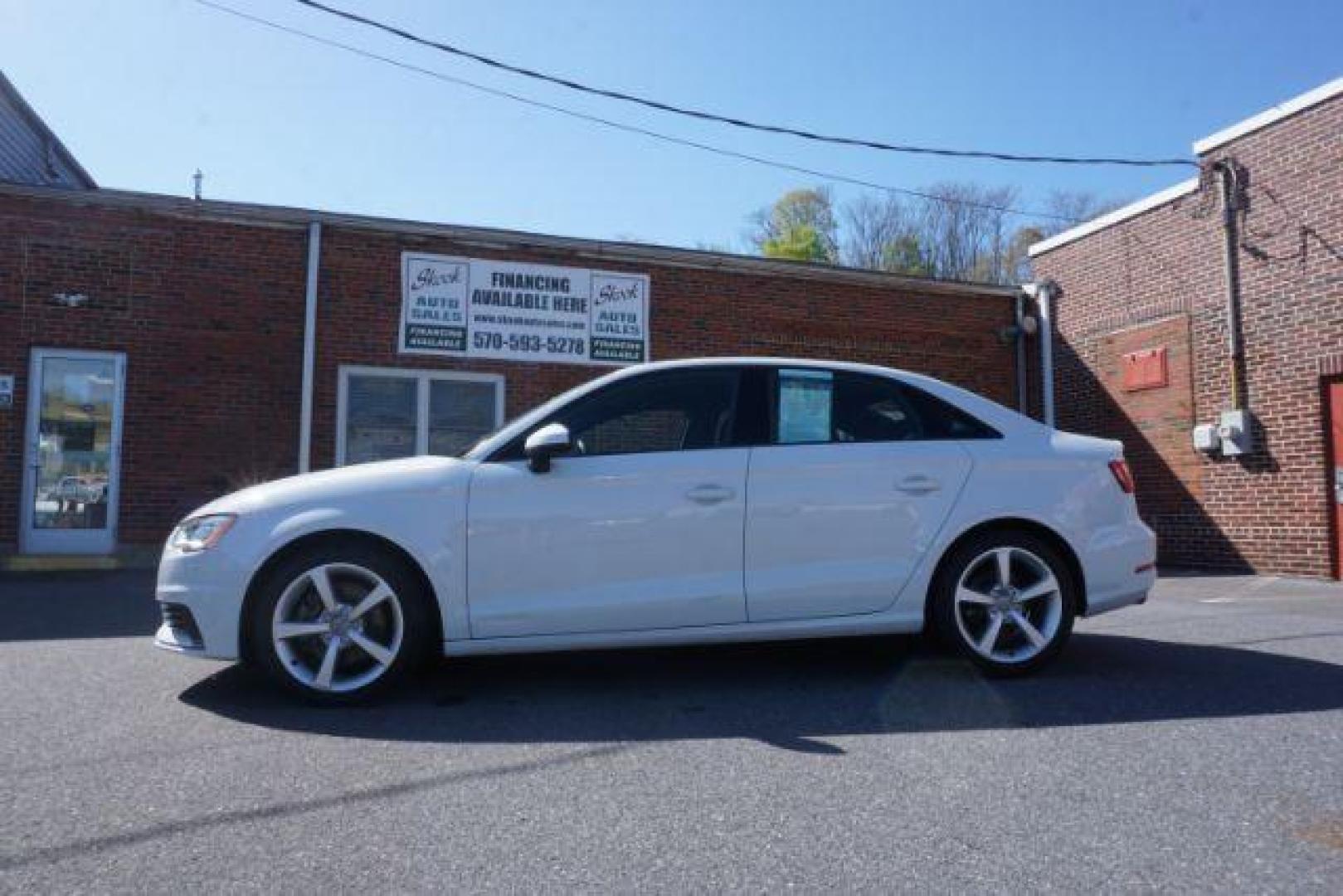 2015 Glacier White Metallic /Black/Magma Red, leather Audi S3 2.0T Premium Plus quattro (WAUBFGFFXF1) with an 2.0L L4 DOHC 16V engine, 6-Speed Automatic transmission, located at 312 Centre Ave, Schuylkill Haven, PA, 17972, (570) 593-5278, 40.638130, -76.177383 - back up camera, blind spot monitor, rear parking sensors - Photo#0