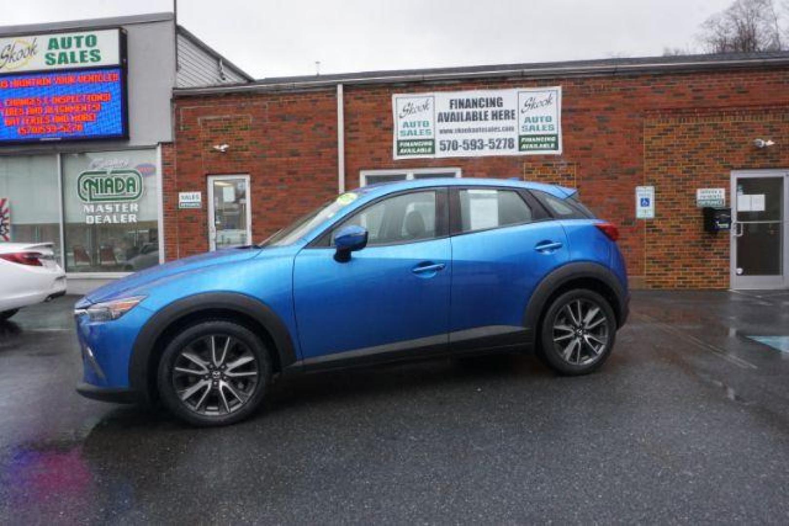 2017 Dynamic Blue Mica /Black Mazda CX-3 Touring AWD (JM1DKFC77H0) with an 2.0L L4 DOHC 16V engine, 6-Speed Automatic transmission, located at 312 Centre Ave, Schuylkill Haven, PA, 17972, (570) 593-5278, 40.638130, -76.177383 - Bose premium sound, Navigation, Rear Parking Sensors - Photo#0