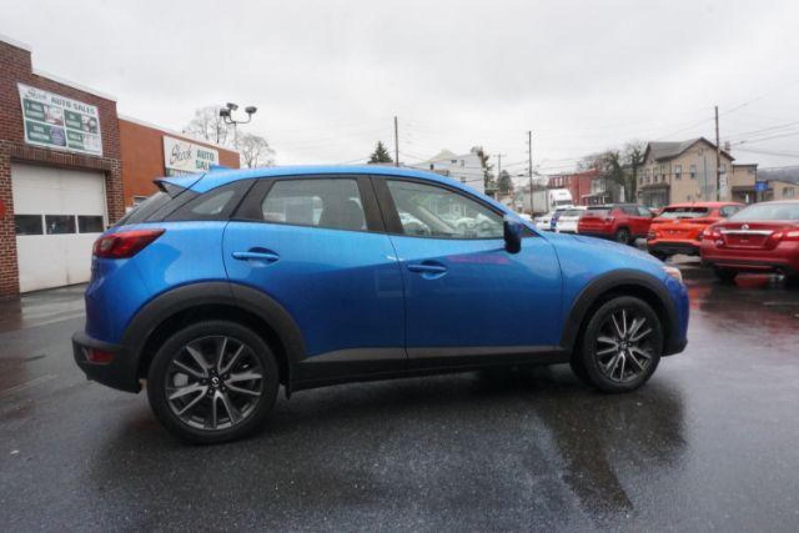 2017 Dynamic Blue Mica /Black Mazda CX-3 Touring AWD (JM1DKFC77H0) with an 2.0L L4 DOHC 16V engine, 6-Speed Automatic transmission, located at 312 Centre Ave, Schuylkill Haven, PA, 17972, (570) 593-5278, 40.638130, -76.177383 - Bose premium sound, Navigation, Rear Parking Sensors - Photo#9