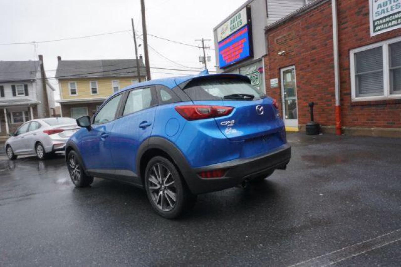 2017 Dynamic Blue Mica /Black Mazda CX-3 Touring AWD (JM1DKFC77H0) with an 2.0L L4 DOHC 16V engine, 6-Speed Automatic transmission, located at 312 Centre Ave, Schuylkill Haven, PA, 17972, (570) 593-5278, 40.638130, -76.177383 - Bose premium sound, Navigation, Rear Parking Sensors - Photo#12