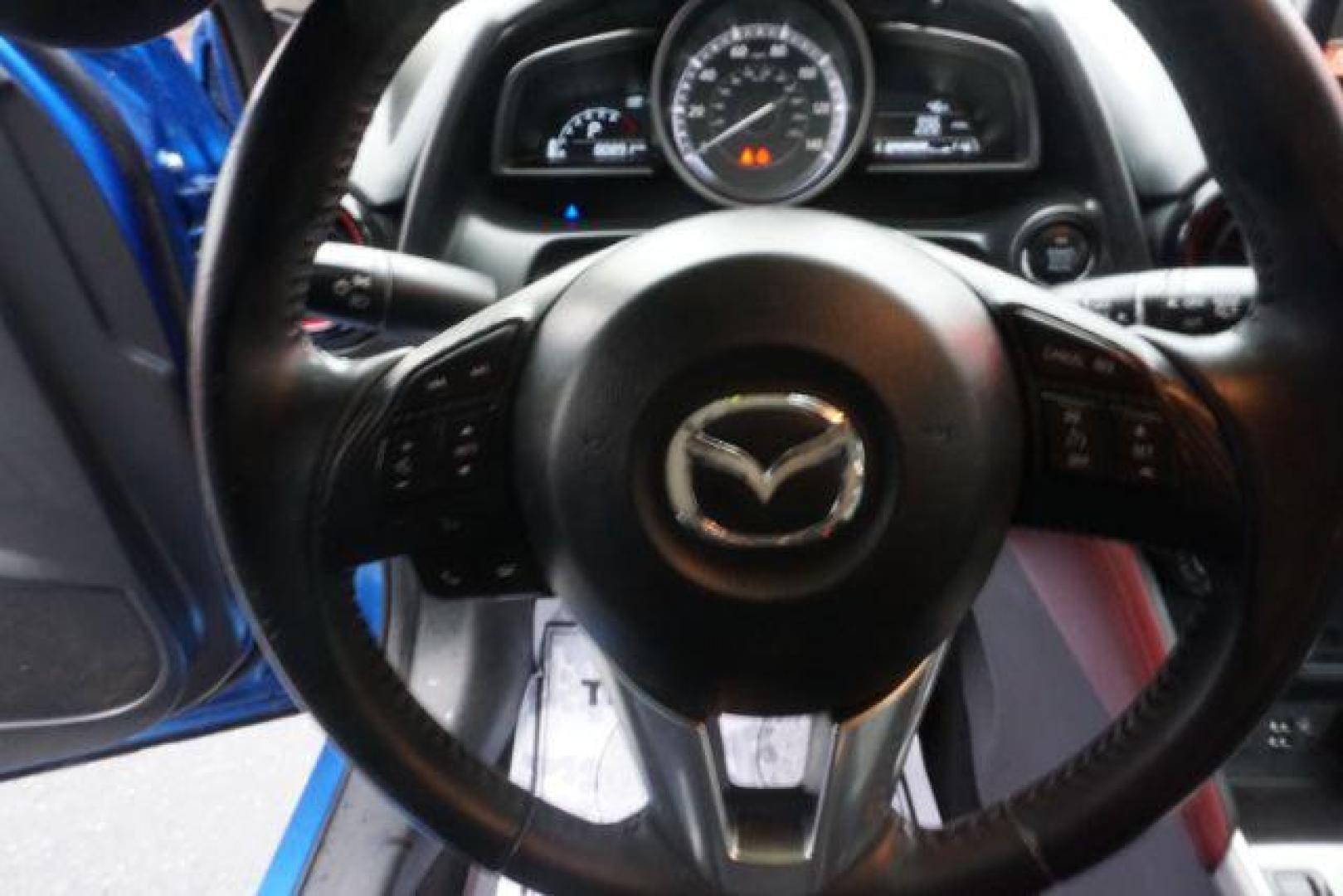 2017 Dynamic Blue Mica /Black Mazda CX-3 Touring AWD (JM1DKFC77H0) with an 2.0L L4 DOHC 16V engine, 6-Speed Automatic transmission, located at 312 Centre Ave, Schuylkill Haven, PA, 17972, (570) 593-5278, 40.638130, -76.177383 - Bose premium sound, Navigation, Rear Parking Sensors - Photo#20