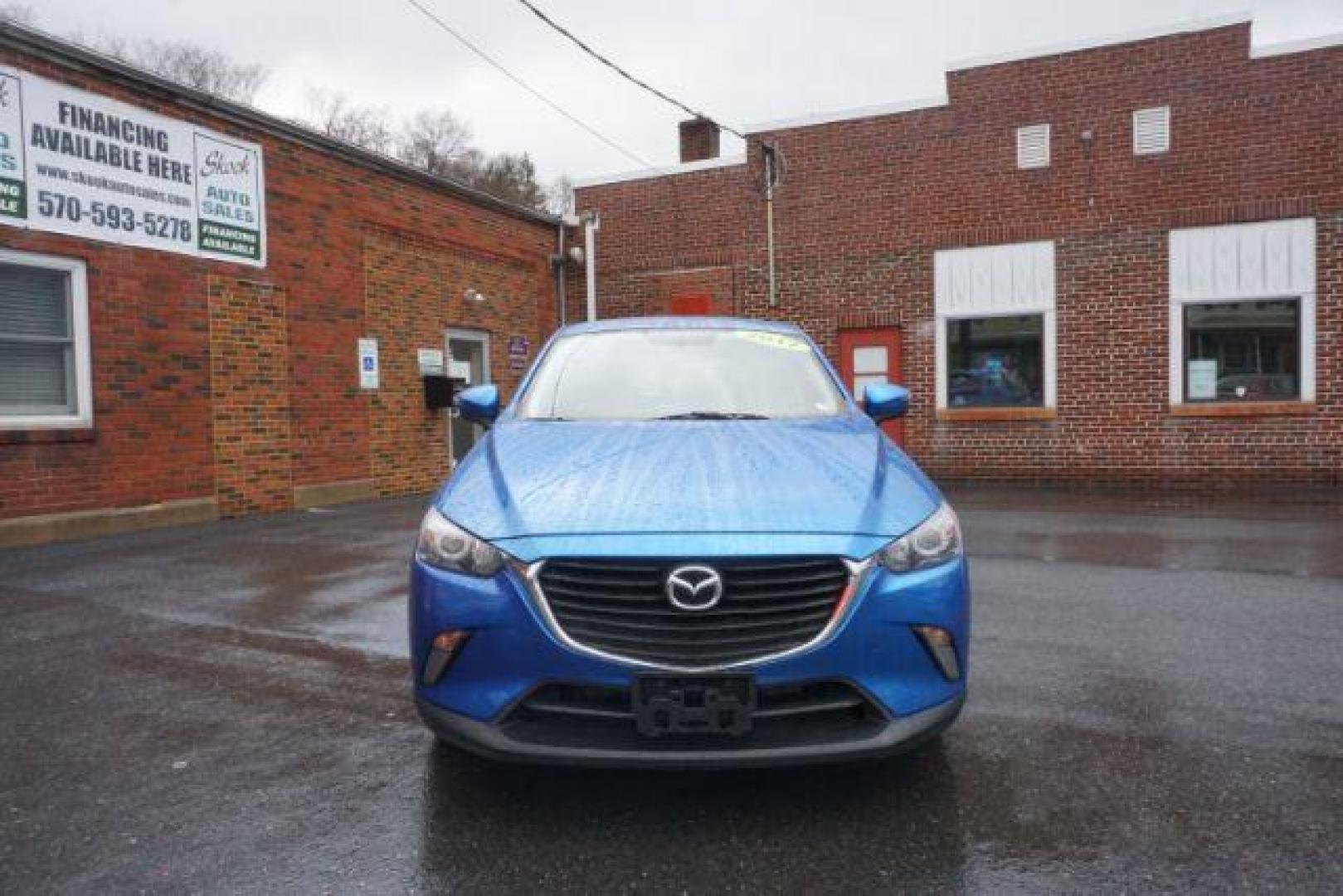 2017 Dynamic Blue Mica /Black Mazda CX-3 Touring AWD (JM1DKFC77H0) with an 2.0L L4 DOHC 16V engine, 6-Speed Automatic transmission, located at 312 Centre Ave, Schuylkill Haven, PA, 17972, (570) 593-5278, 40.638130, -76.177383 - Bose premium sound, Navigation, Rear Parking Sensors - Photo#4