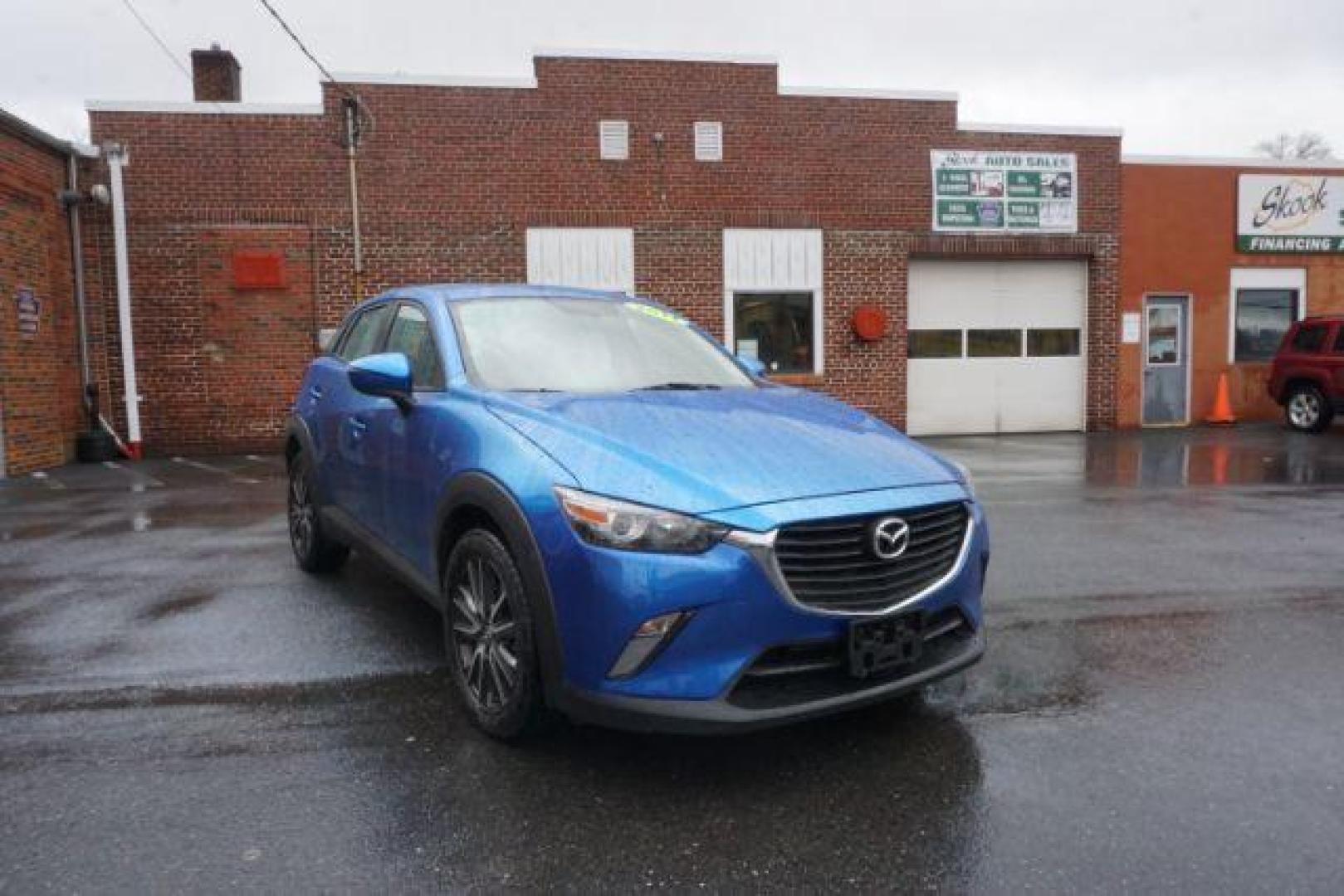 2017 Dynamic Blue Mica /Black Mazda CX-3 Touring AWD (JM1DKFC77H0) with an 2.0L L4 DOHC 16V engine, 6-Speed Automatic transmission, located at 312 Centre Ave, Schuylkill Haven, PA, 17972, (570) 593-5278, 40.638130, -76.177383 - Bose premium sound, Navigation, Rear Parking Sensors - Photo#5