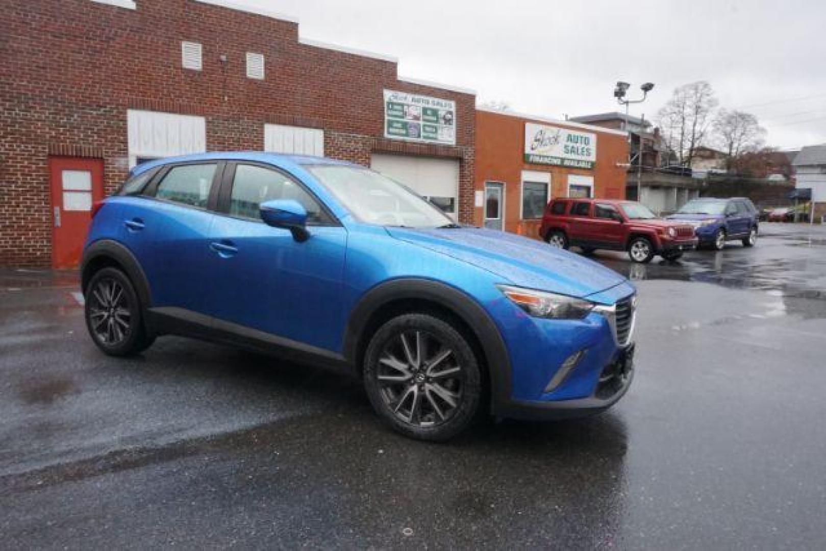 2017 Dynamic Blue Mica /Black Mazda CX-3 Touring AWD (JM1DKFC77H0) with an 2.0L L4 DOHC 16V engine, 6-Speed Automatic transmission, located at 312 Centre Ave, Schuylkill Haven, PA, 17972, (570) 593-5278, 40.638130, -76.177383 - Bose premium sound, Navigation, Rear Parking Sensors - Photo#6