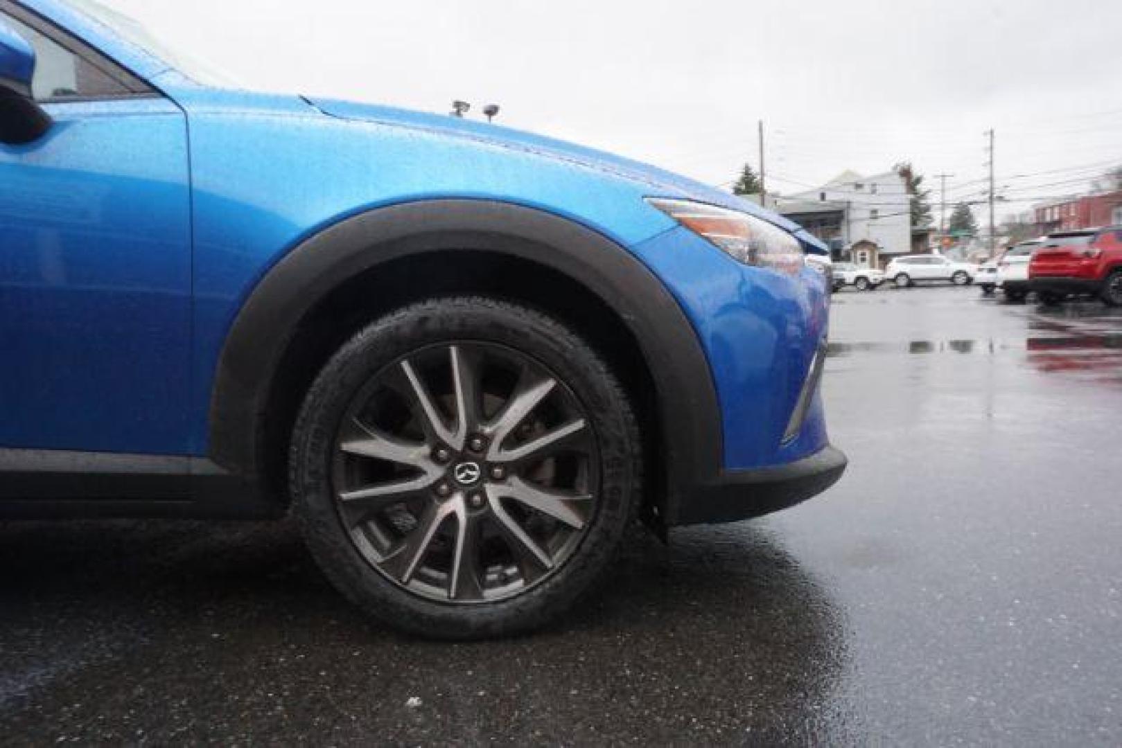 2017 Dynamic Blue Mica /Black Mazda CX-3 Touring AWD (JM1DKFC77H0) with an 2.0L L4 DOHC 16V engine, 6-Speed Automatic transmission, located at 312 Centre Ave, Schuylkill Haven, PA, 17972, (570) 593-5278, 40.638130, -76.177383 - Bose premium sound, Navigation, Rear Parking Sensors - Photo#7