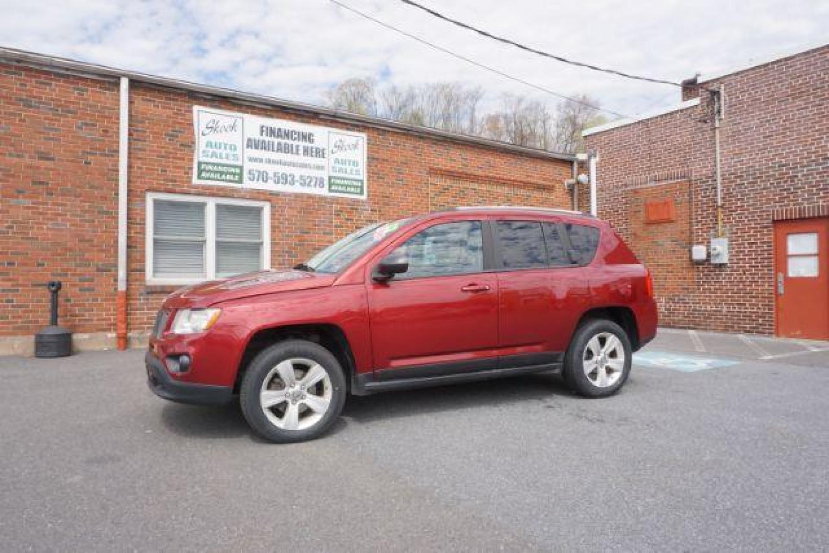 2012 Deep Cherry Red Crys Jeep Compass Sport 4WD (1C4NJDBB6CD) with an 2.4L L4 DOHC 16V engine, Continuously Variabl transmission, located at 312 Centre Ave, Schuylkill Haven, PA, 17972, (570) 593-5278, 40.638130, -76.177383 - Photo#0