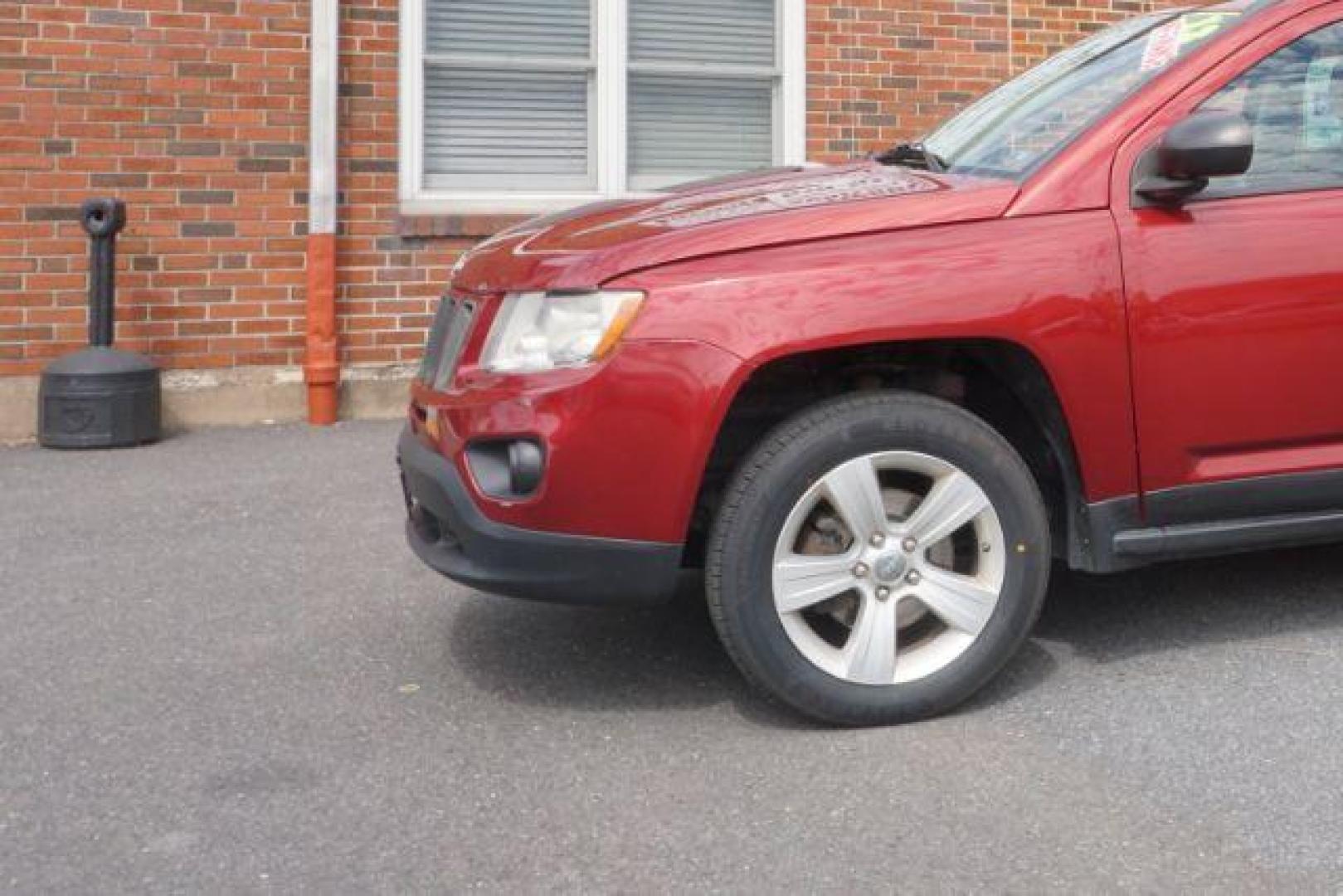 2012 Deep Cherry Red Crys Jeep Compass Sport 4WD (1C4NJDBB6CD) with an 2.4L L4 DOHC 16V engine, Continuously Variabl transmission, located at 312 Centre Ave, Schuylkill Haven, PA, 17972, (570) 593-5278, 40.638130, -76.177383 - Photo#1