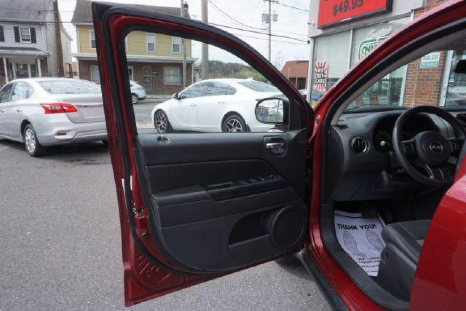 2012 Deep Cherry Red Crys Jeep Compass Sport 4WD (1C4NJDBB6CD) with an 2.4L L4 DOHC 16V engine, Continuously Variabl transmission, located at 312 Centre Ave, Schuylkill Haven, PA, 17972, (570) 593-5278, 40.638130, -76.177383 - Photo#22