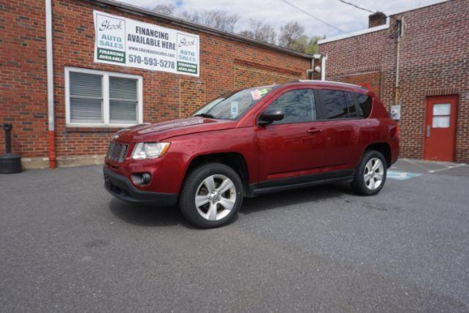 2012 Deep Cherry Red Crys Jeep Compass Sport 4WD (1C4NJDBB6CD) with an 2.4L L4 DOHC 16V engine, Continuously Variabl transmission, located at 312 Centre Ave, Schuylkill Haven, PA, 17972, (570) 593-5278, 40.638130, -76.177383 - Photo#2