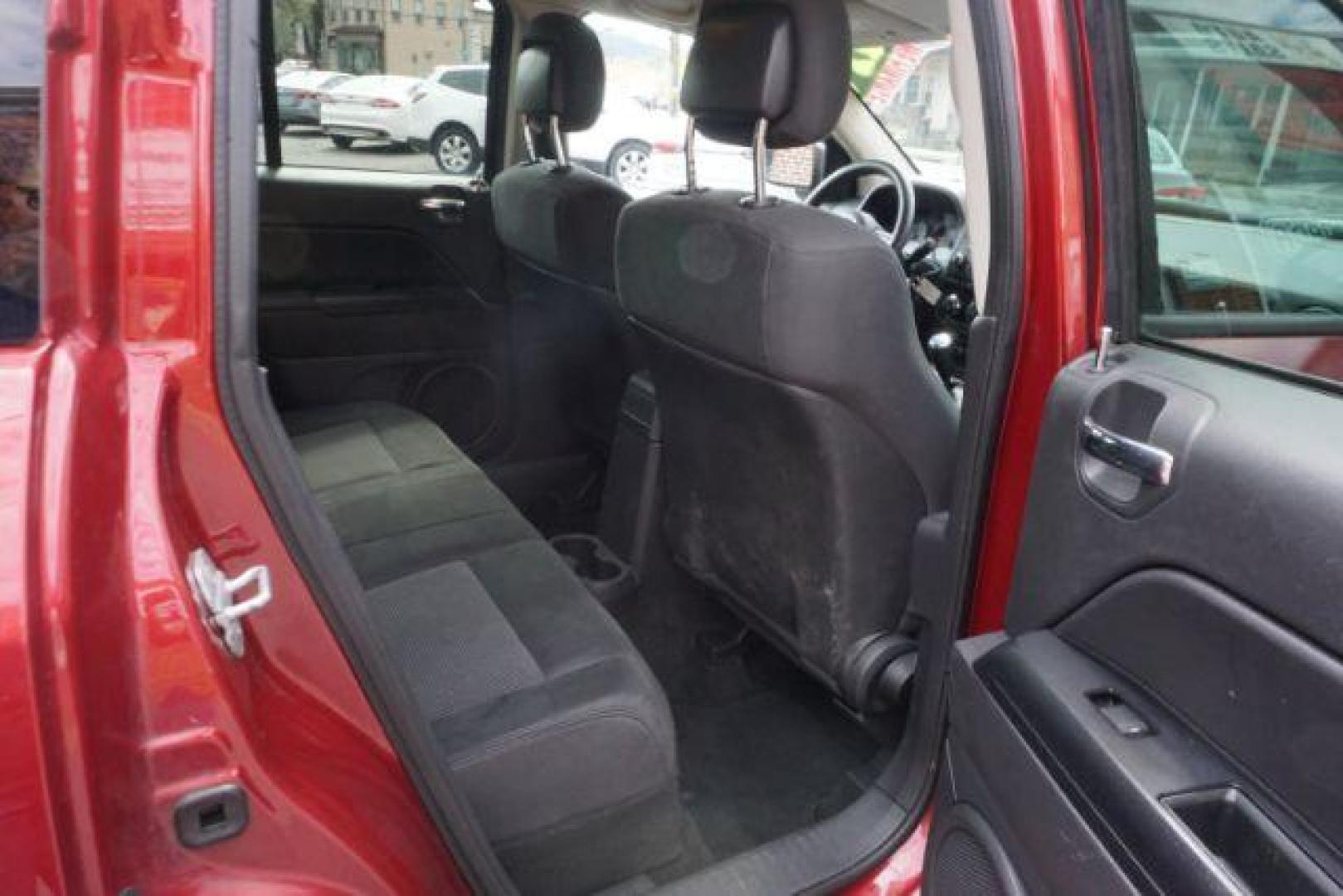 2012 Deep Cherry Red Crys Jeep Compass Sport 4WD (1C4NJDBB6CD) with an 2.4L L4 DOHC 16V engine, Continuously Variabl transmission, located at 312 Centre Ave, Schuylkill Haven, PA, 17972, (570) 593-5278, 40.638130, -76.177383 - Photo#49