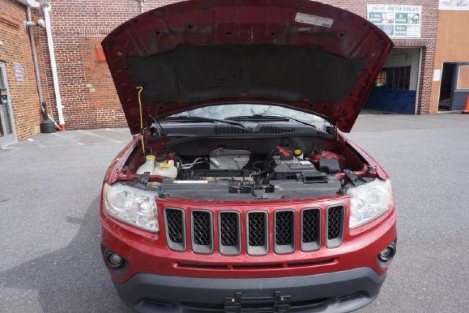 2012 Deep Cherry Red Crys Jeep Compass Sport 4WD (1C4NJDBB6CD) with an 2.4L L4 DOHC 16V engine, Continuously Variabl transmission, located at 312 Centre Ave, Schuylkill Haven, PA, 17972, (570) 593-5278, 40.638130, -76.177383 - Photo#59