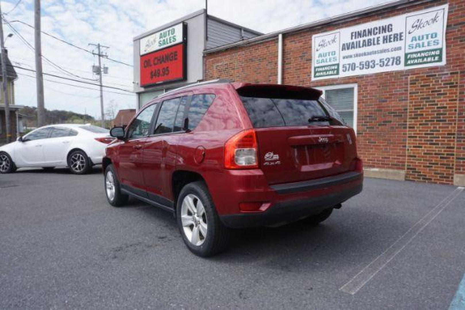 2012 Deep Cherry Red Crys Jeep Compass Sport 4WD (1C4NJDBB6CD) with an 2.4L L4 DOHC 16V engine, Continuously Variabl transmission, located at 312 Centre Ave, Schuylkill Haven, PA, 17972, (570) 593-5278, 40.638130, -76.177383 - Photo#7