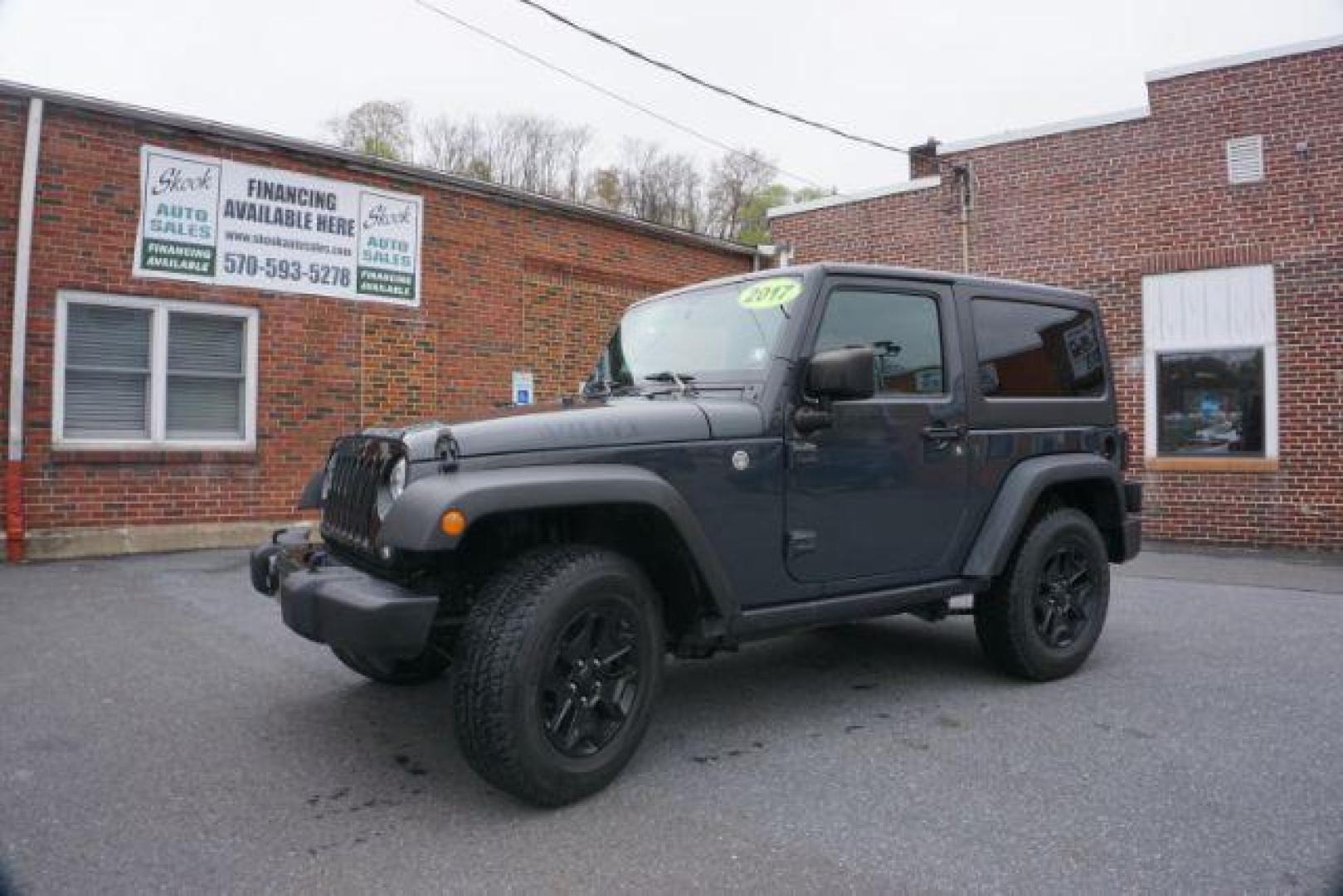 2017 Black Clear Coat Jeep Wrangler Sport 4WD (1C4AJWAG1HL) with an 3.6L V6 DOHC 24V FFV engine, 5-Speed Automatic transmission, located at 312 Centre Ave, Schuylkill Haven, PA, 17972, (570) 593-5278, 40.638130, -76.177383 - hard top, locking/limited slip differential, towing package - Photo#3