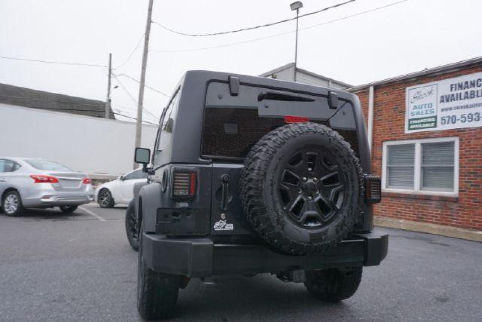 2017 Black Clear Coat Jeep Wrangler Sport 4WD (1C4AJWAG1HL) with an 3.6L V6 DOHC 24V FFV engine, 5-Speed Automatic transmission, located at 312 Centre Ave, Schuylkill Haven, PA, 17972, (570) 593-5278, 40.638130, -76.177383 - hard top, locking/limited slip differential, towing package - Photo#9