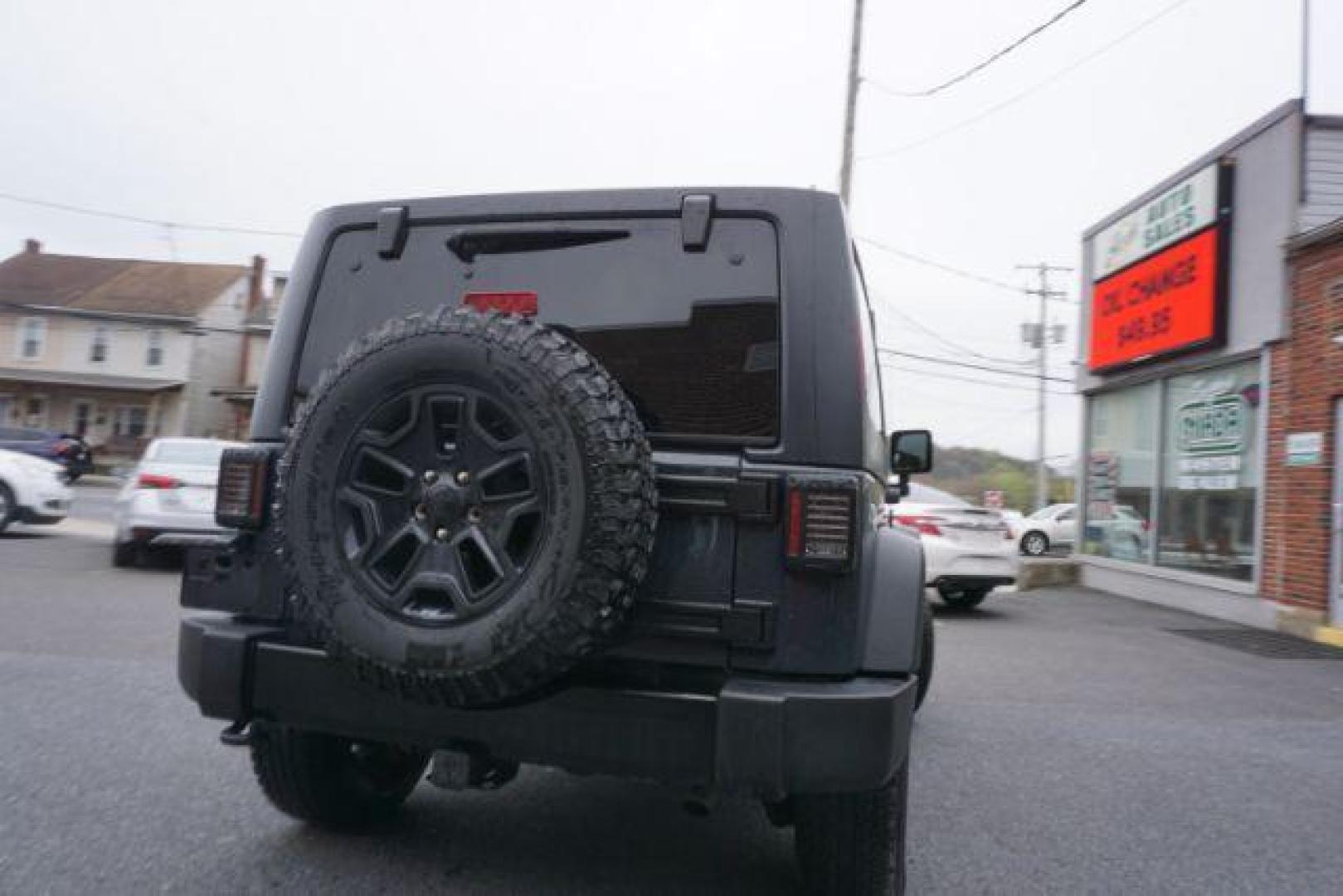 2017 Black Clear Coat Jeep Wrangler Sport 4WD (1C4AJWAG1HL) with an 3.6L V6 DOHC 24V FFV engine, 5-Speed Automatic transmission, located at 312 Centre Ave, Schuylkill Haven, PA, 17972, (570) 593-5278, 40.638130, -76.177383 - hard top, locking/limited slip differential, towing package - Photo#11