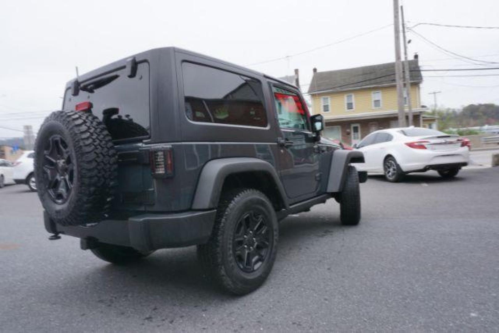 2017 Black Clear Coat Jeep Wrangler Sport 4WD (1C4AJWAG1HL) with an 3.6L V6 DOHC 24V FFV engine, 5-Speed Automatic transmission, located at 312 Centre Ave, Schuylkill Haven, PA, 17972, (570) 593-5278, 40.638130, -76.177383 - hard top, locking/limited slip differential, towing package - Photo#12