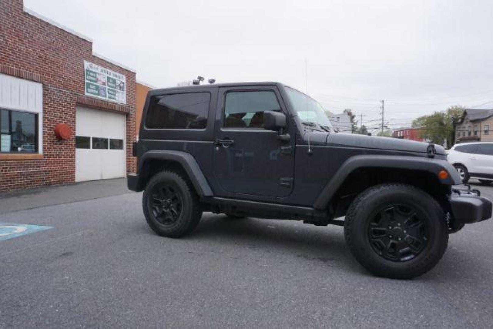 2017 Black Clear Coat Jeep Wrangler Sport 4WD (1C4AJWAG1HL) with an 3.6L V6 DOHC 24V FFV engine, 5-Speed Automatic transmission, located at 312 Centre Ave, Schuylkill Haven, PA, 17972, (570) 593-5278, 40.638130, -76.177383 - hard top, locking/limited slip differential, towing package - Photo#16