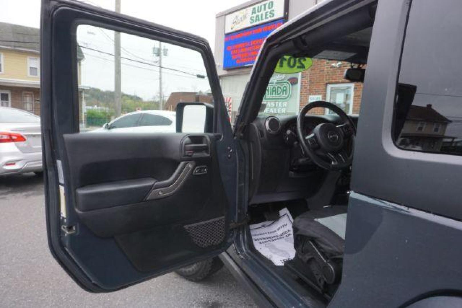 2017 Black Clear Coat Jeep Wrangler Sport 4WD (1C4AJWAG1HL) with an 3.6L V6 DOHC 24V FFV engine, 5-Speed Automatic transmission, located at 312 Centre Ave, Schuylkill Haven, PA, 17972, (570) 593-5278, 40.638130, -76.177383 - hard top, locking/limited slip differential, towing package - Photo#21