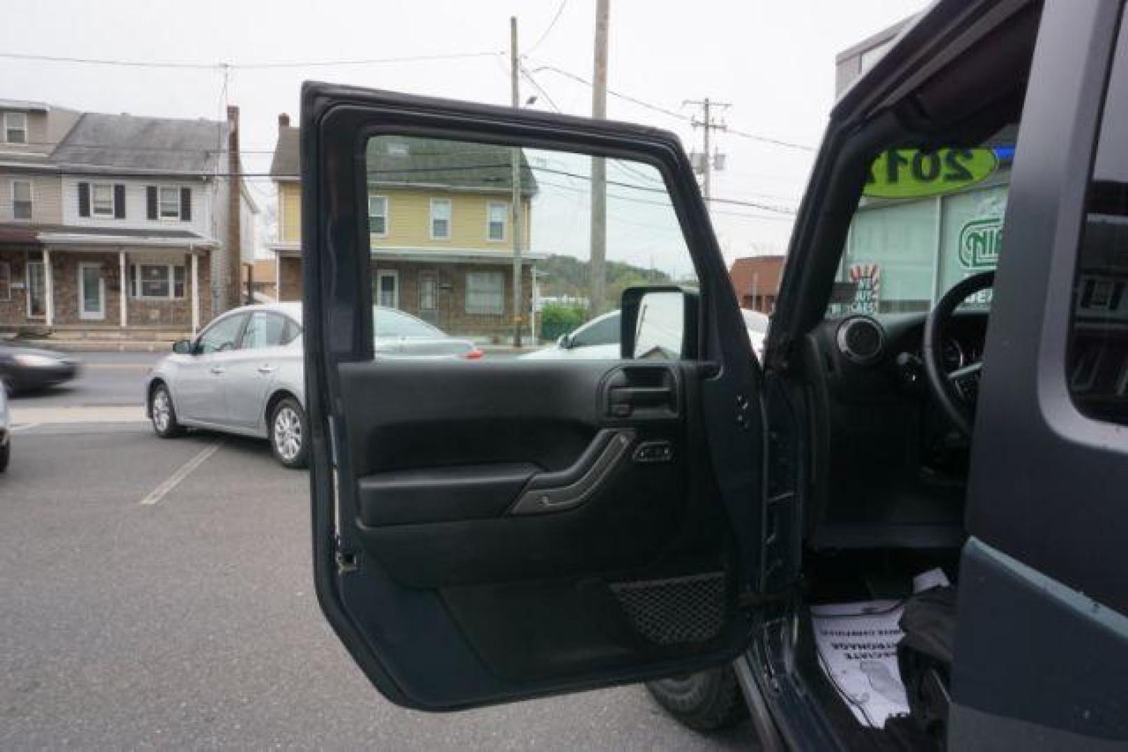 2017 Black Clear Coat Jeep Wrangler Sport 4WD (1C4AJWAG1HL) with an 3.6L V6 DOHC 24V FFV engine, 5-Speed Automatic transmission, located at 312 Centre Ave, Schuylkill Haven, PA, 17972, (570) 593-5278, 40.638130, -76.177383 - hard top, locking/limited slip differential, towing package - Photo#22