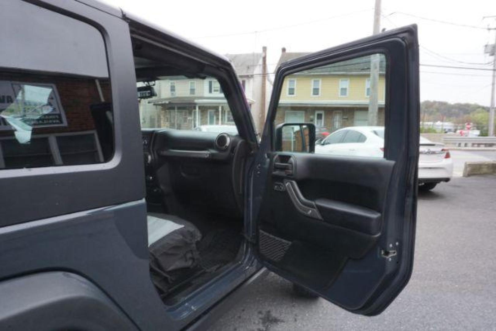 2017 Black Clear Coat Jeep Wrangler Sport 4WD (1C4AJWAG1HL) with an 3.6L V6 DOHC 24V FFV engine, 5-Speed Automatic transmission, located at 312 Centre Ave, Schuylkill Haven, PA, 17972, (570) 593-5278, 40.638130, -76.177383 - hard top, locking/limited slip differential, towing package - Photo#39