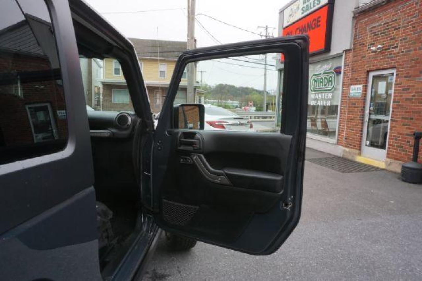 2017 Black Clear Coat Jeep Wrangler Sport 4WD (1C4AJWAG1HL) with an 3.6L V6 DOHC 24V FFV engine, 5-Speed Automatic transmission, located at 312 Centre Ave, Schuylkill Haven, PA, 17972, (570) 593-5278, 40.638130, -76.177383 - hard top, locking/limited slip differential, towing package - Photo#40