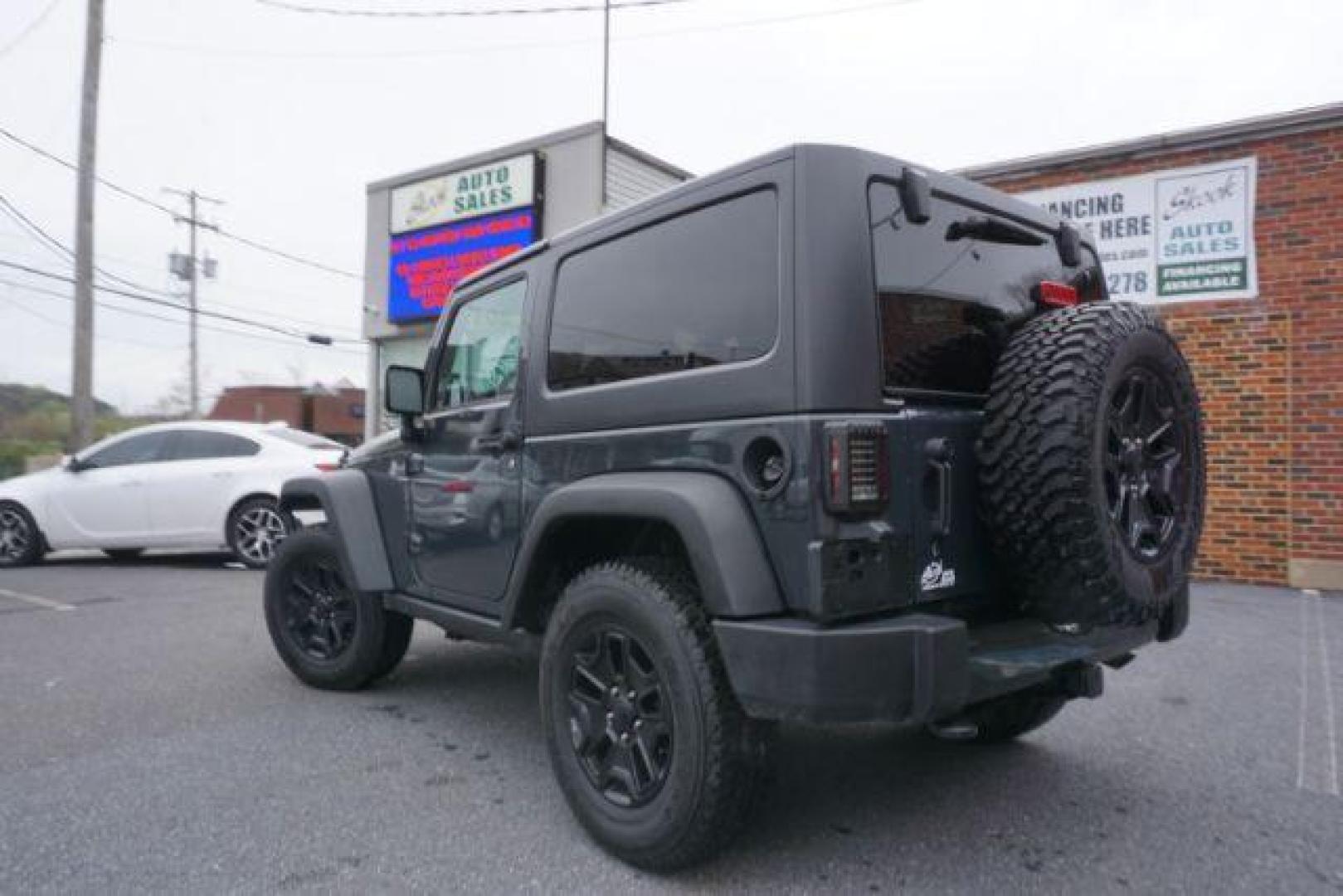 2017 Black Clear Coat Jeep Wrangler Sport 4WD (1C4AJWAG1HL) with an 3.6L V6 DOHC 24V FFV engine, 5-Speed Automatic transmission, located at 312 Centre Ave, Schuylkill Haven, PA, 17972, (570) 593-5278, 40.638130, -76.177383 - hard top, locking/limited slip differential, towing package - Photo#8