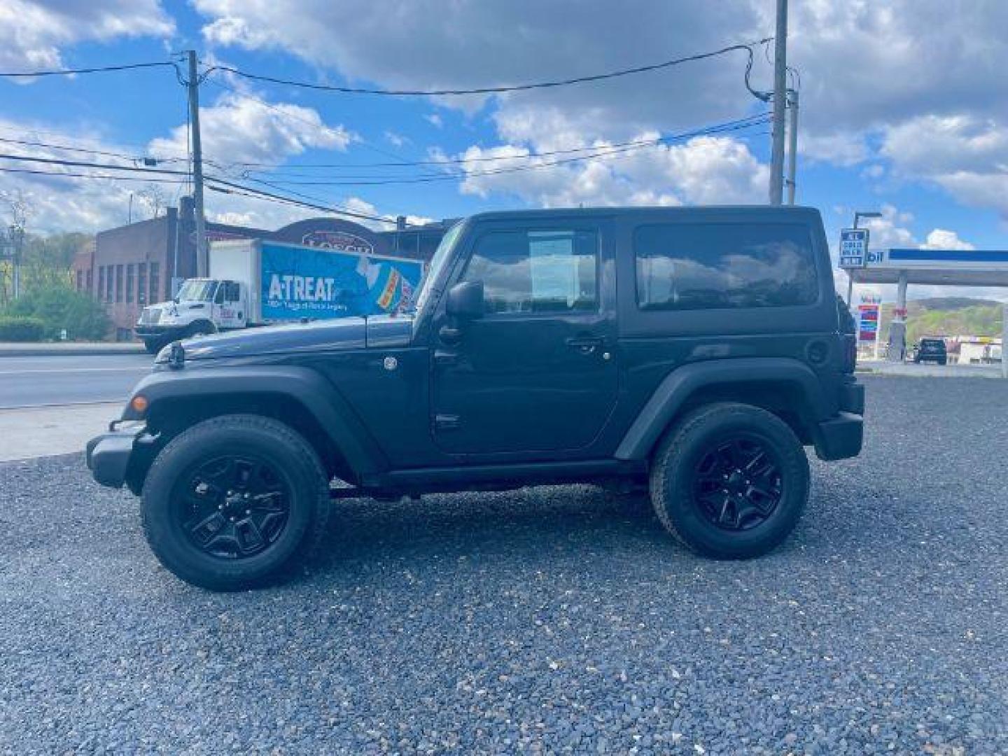 2017 Black Clear Coat Jeep Wrangler Sport 4WD (1C4AJWAG1HL) with an 3.6L V6 DOHC 24V FFV engine, 5-Speed Automatic transmission, located at 312 Centre Ave, Schuylkill Haven, PA, 17972, (570) 593-5278, 40.638130, -76.177383 - hard top, locking/limited slip differential, towing package - Photo#1