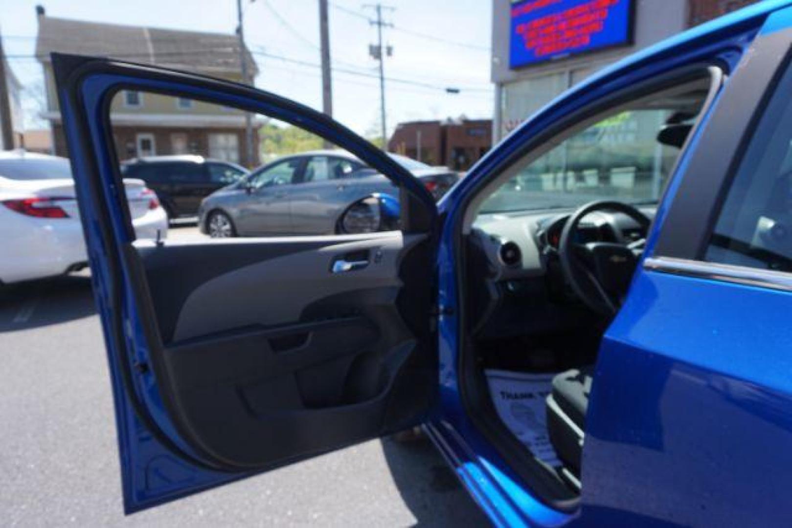 2016 Kinetic Blue Metallic Chevrolet Sonic LT Auto Sedan (1G1JC5SG5G4) with an 1.8L L4 DOHC 24V engine, 6-Speed Automatic transmission, located at 312 Centre Ave, Schuylkill Haven, PA, 17972, (570) 593-5278, 40.638130, -76.177383 - backup camera, fog lights - Photo#17