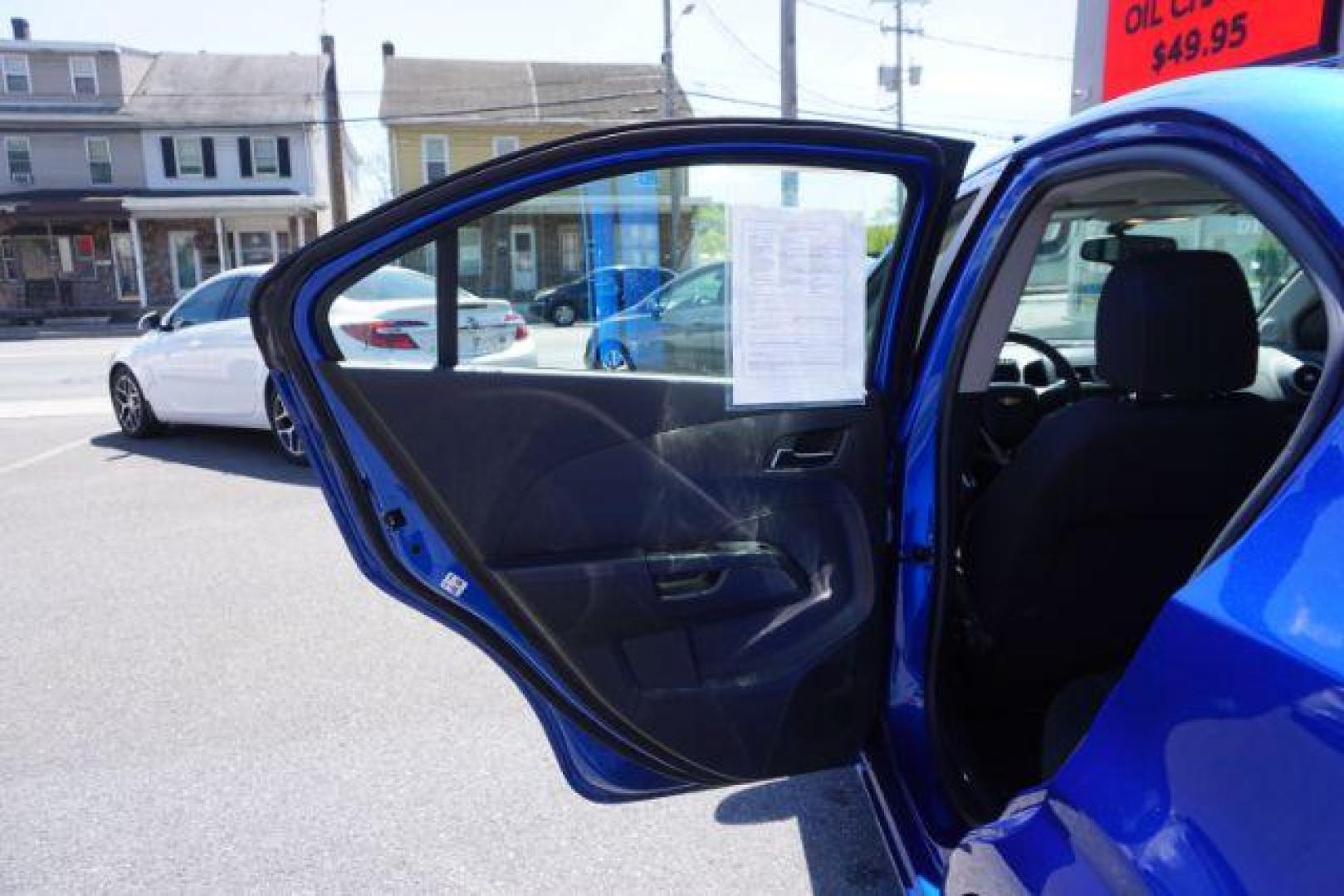 2016 Kinetic Blue Metallic Chevrolet Sonic LT Auto Sedan (1G1JC5SG5G4) with an 1.8L L4 DOHC 24V engine, 6-Speed Automatic transmission, located at 312 Centre Ave, Schuylkill Haven, PA, 17972, (570) 593-5278, 40.638130, -76.177383 - backup camera, fog lights - Photo#28