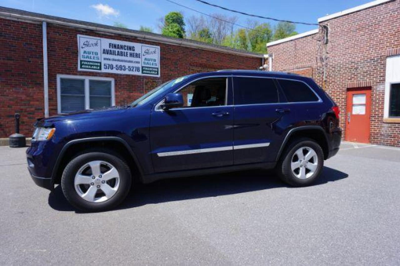 2013 True Blue Pearl Jeep Grand Cherokee Laredo 4WD (1C4RJFAG7DC) with an 3.6L V6 DOHC 24V engine, 5-Speed Automatic transmission, located at 312 Centre Ave, Schuylkill Haven, PA, 17972, (570) 593-5278, 40.638130, -76.177383 - automatic climate control, back up camera, heated front seats, leather seats, navigation, power sunroof, rear parking sensors, towing pkg - Photo#0