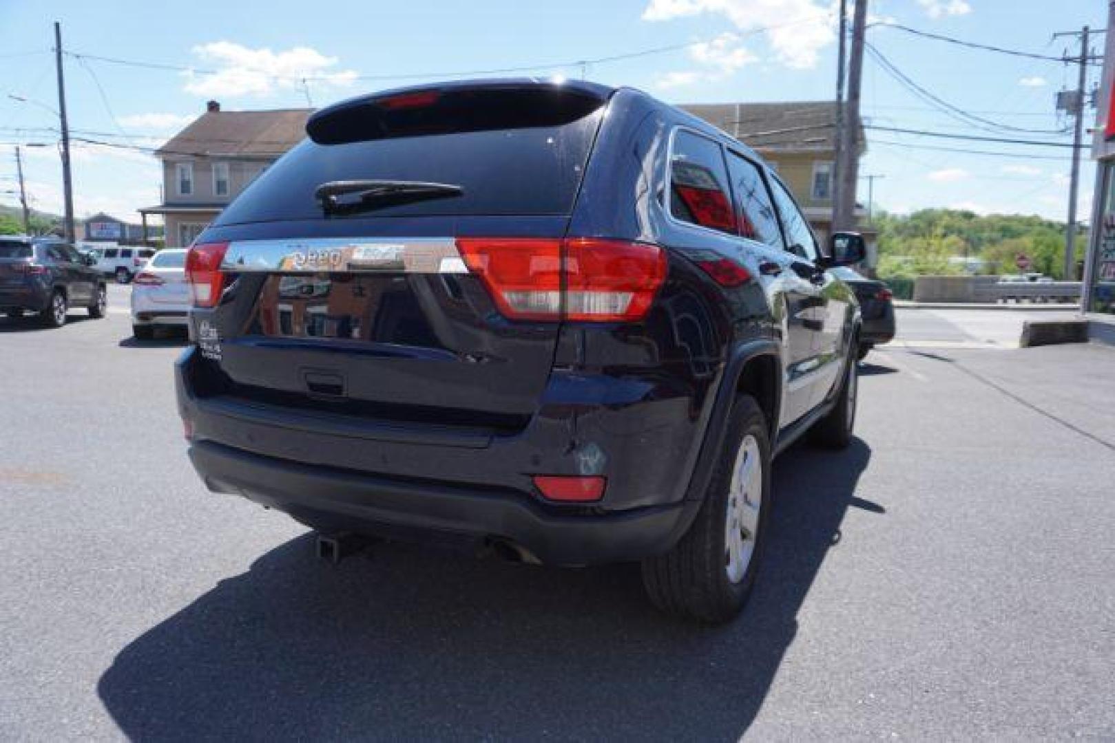 2013 True Blue Pearl Jeep Grand Cherokee Laredo 4WD (1C4RJFAG7DC) with an 3.6L V6 DOHC 24V engine, 5-Speed Automatic transmission, located at 312 Centre Ave, Schuylkill Haven, PA, 17972, (570) 593-5278, 40.638130, -76.177383 - automatic climate control, back up camera, heated front seats, leather seats, navigation, power sunroof, rear parking sensors, towing pkg - Photo#9