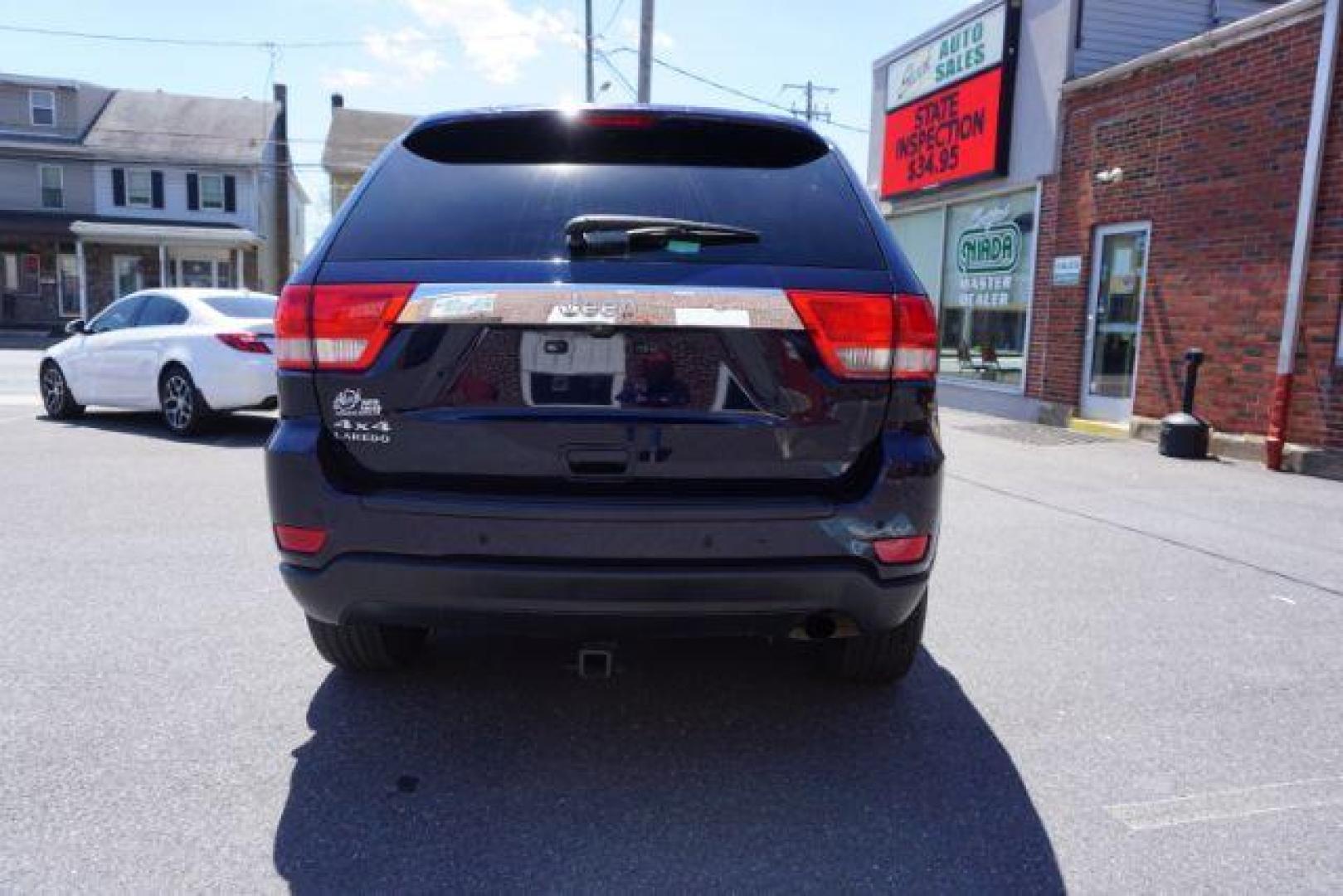 2013 True Blue Pearl Jeep Grand Cherokee Laredo 4WD (1C4RJFAG7DC) with an 3.6L V6 DOHC 24V engine, 5-Speed Automatic transmission, located at 312 Centre Ave, Schuylkill Haven, PA, 17972, (570) 593-5278, 40.638130, -76.177383 - automatic climate control, back up camera, heated front seats, leather seats, navigation, power sunroof, rear parking sensors, towing pkg - Photo#10