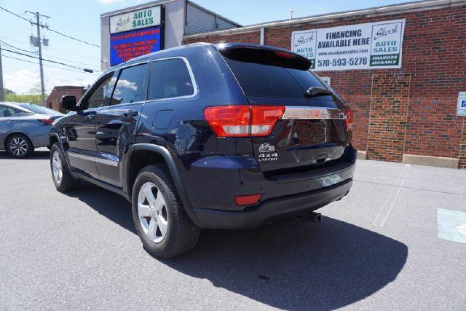 2013 True Blue Pearl Jeep Grand Cherokee Laredo 4WD (1C4RJFAG7DC) with an 3.6L V6 DOHC 24V engine, 5-Speed Automatic transmission, located at 312 Centre Ave, Schuylkill Haven, PA, 17972, (570) 593-5278, 40.638130, -76.177383 - automatic climate control, back up camera, heated front seats, leather seats, navigation, power sunroof, rear parking sensors, towing pkg - Photo#11