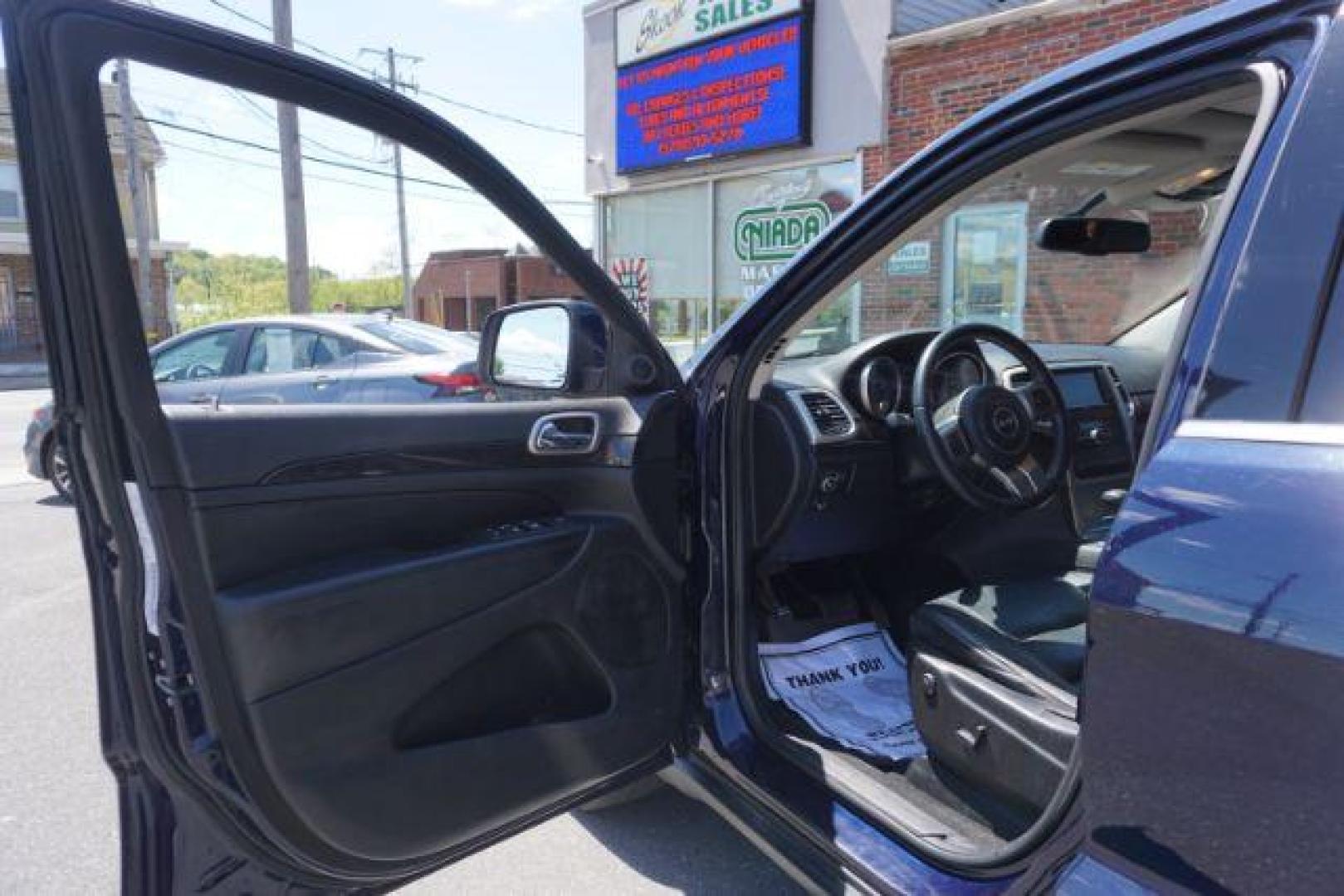 2013 True Blue Pearl Jeep Grand Cherokee Laredo 4WD (1C4RJFAG7DC) with an 3.6L V6 DOHC 24V engine, 5-Speed Automatic transmission, located at 312 Centre Ave, Schuylkill Haven, PA, 17972, (570) 593-5278, 40.638130, -76.177383 - automatic climate control, back up camera, heated front seats, leather seats, navigation, power sunroof, rear parking sensors, towing pkg - Photo#15