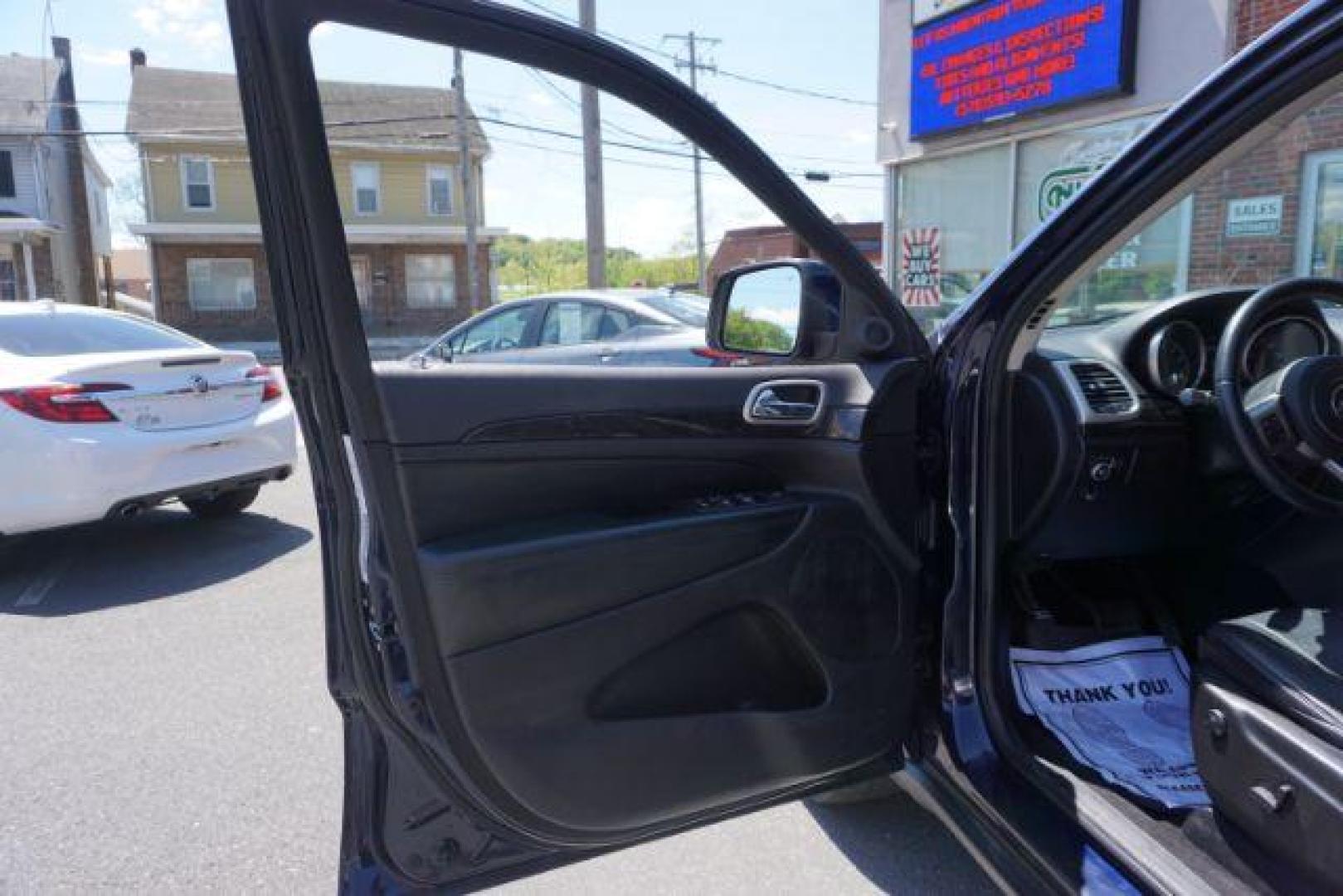 2013 True Blue Pearl Jeep Grand Cherokee Laredo 4WD (1C4RJFAG7DC) with an 3.6L V6 DOHC 24V engine, 5-Speed Automatic transmission, located at 312 Centre Ave, Schuylkill Haven, PA, 17972, (570) 593-5278, 40.638130, -76.177383 - automatic climate control, back up camera, heated front seats, leather seats, navigation, power sunroof, rear parking sensors, towing pkg - Photo#16