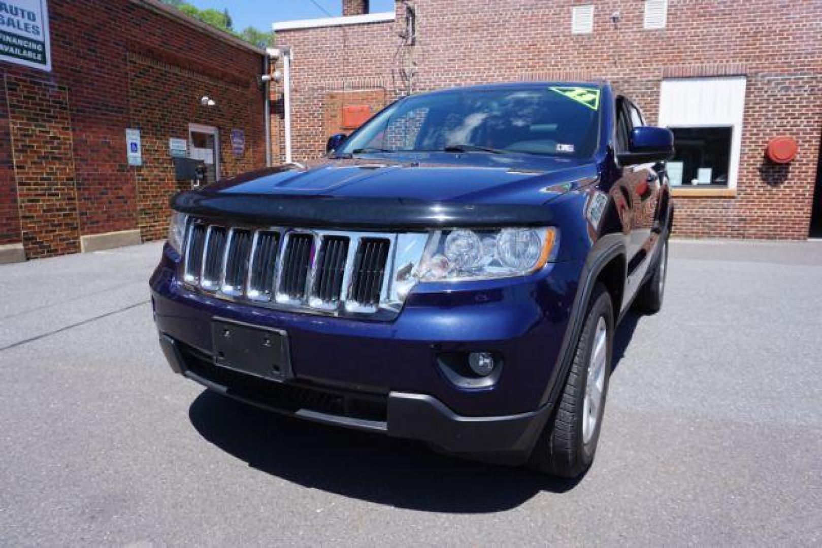 2013 True Blue Pearl Jeep Grand Cherokee Laredo 4WD (1C4RJFAG7DC) with an 3.6L V6 DOHC 24V engine, 5-Speed Automatic transmission, located at 312 Centre Ave, Schuylkill Haven, PA, 17972, (570) 593-5278, 40.638130, -76.177383 - automatic climate control, back up camera, heated front seats, leather seats, navigation, power sunroof, rear parking sensors, towing pkg - Photo#2