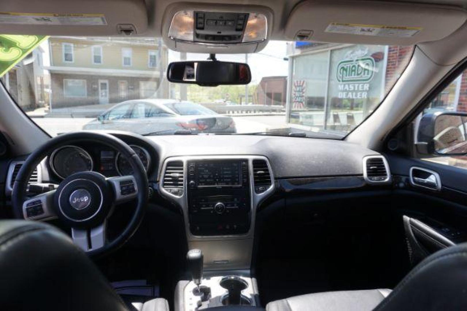 2013 True Blue Pearl Jeep Grand Cherokee Laredo 4WD (1C4RJFAG7DC) with an 3.6L V6 DOHC 24V engine, 5-Speed Automatic transmission, located at 312 Centre Ave, Schuylkill Haven, PA, 17972, (570) 593-5278, 40.638130, -76.177383 - automatic climate control, back up camera, heated front seats, leather seats, navigation, power sunroof, rear parking sensors, towing pkg - Photo#35