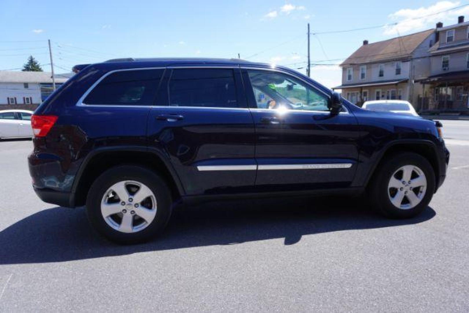 2013 True Blue Pearl Jeep Grand Cherokee Laredo 4WD (1C4RJFAG7DC) with an 3.6L V6 DOHC 24V engine, 5-Speed Automatic transmission, located at 312 Centre Ave, Schuylkill Haven, PA, 17972, (570) 593-5278, 40.638130, -76.177383 - automatic climate control, back up camera, heated front seats, leather seats, navigation, power sunroof, rear parking sensors, towing pkg - Photo#7